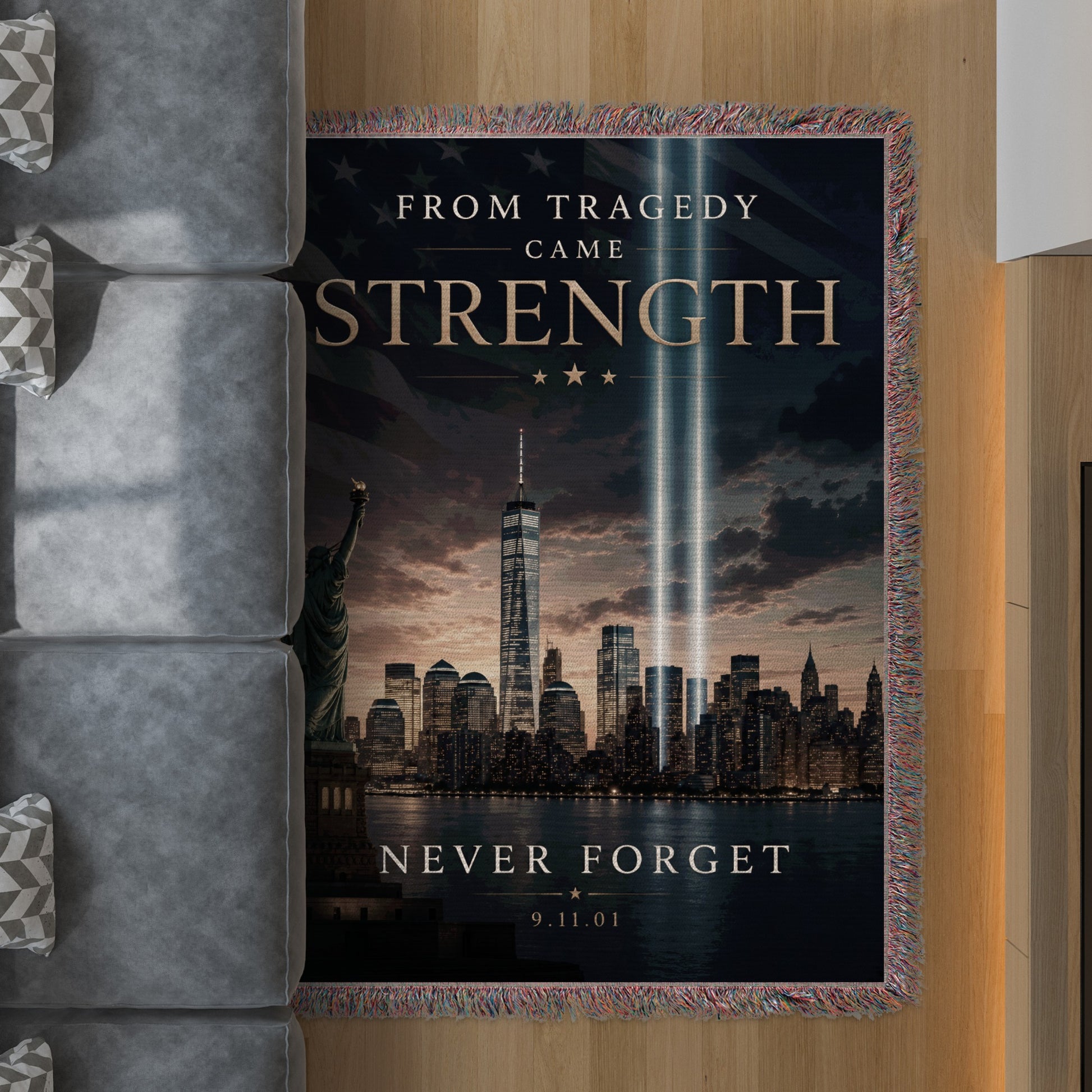 Tribute to 9/11: "From Tragedy Came Strength," with skyline and tribute lights.