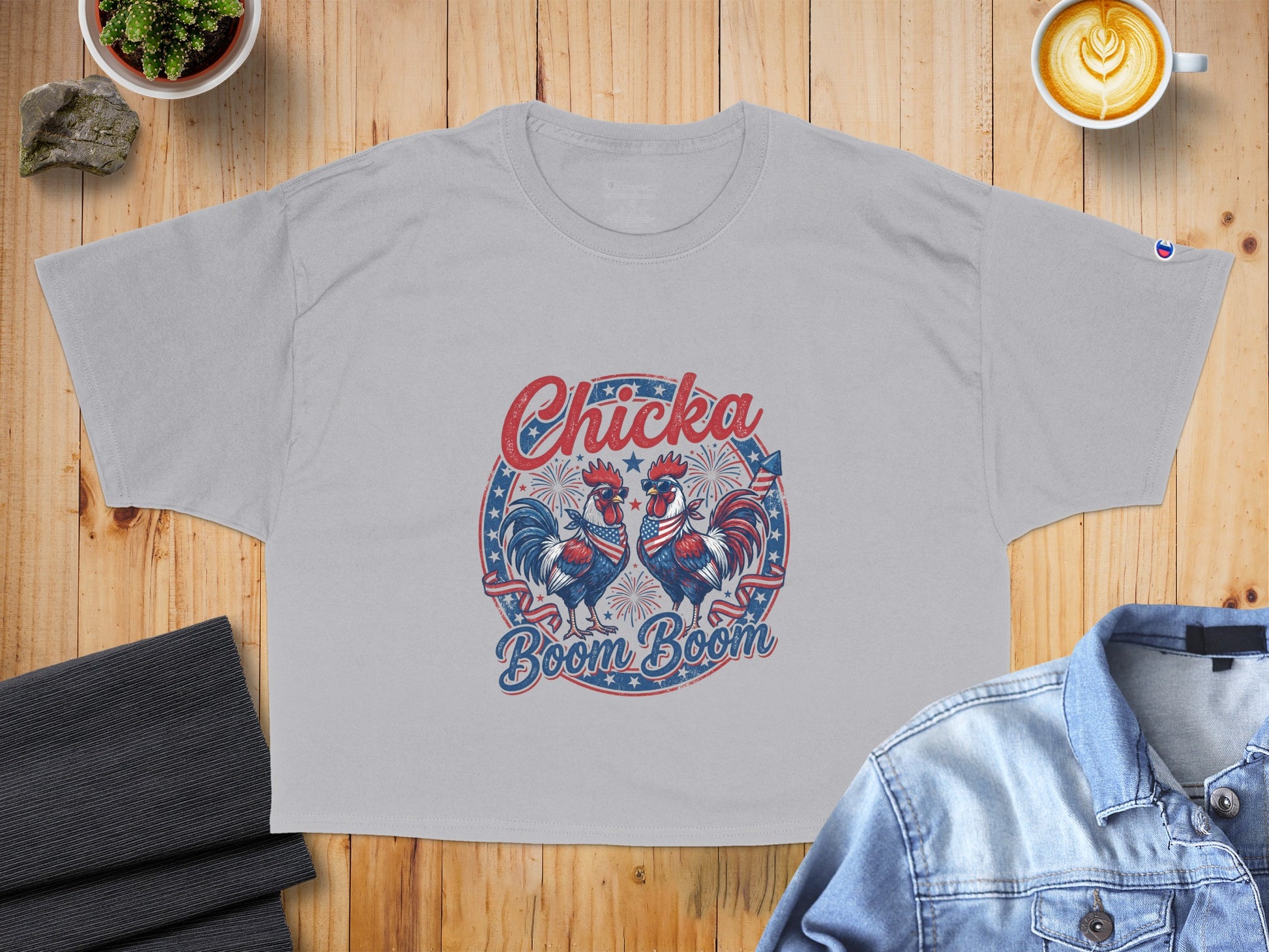 Light grey t-shirt with two roosters in patriotic attire, text "Chicka Boom Boom".
