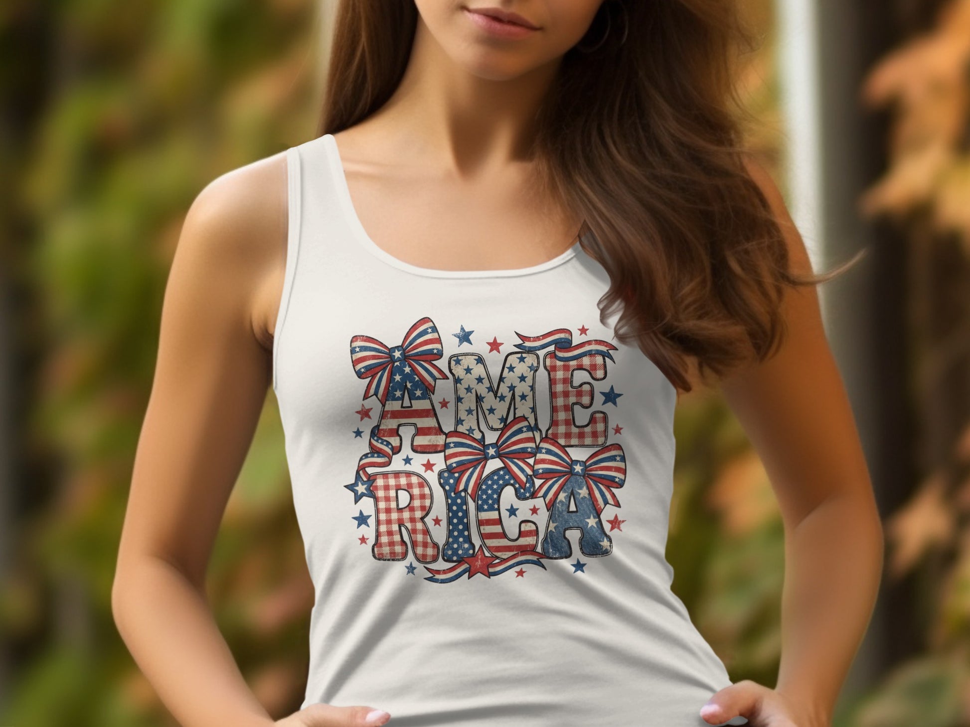White tank top with distressed "AMERICA" text featuring patriotic bows and stars.