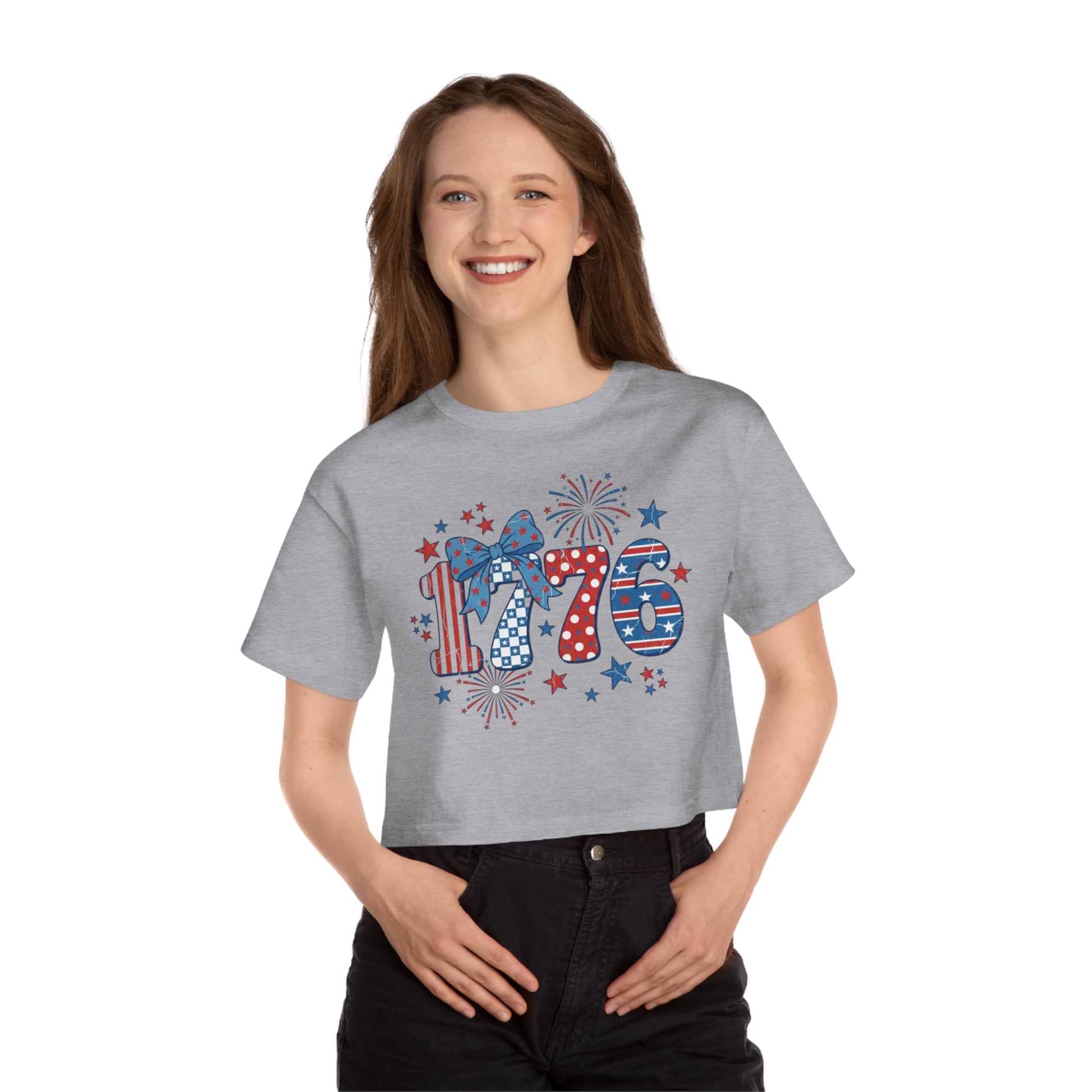 Grey crop t-shirt with "1776" in patriotic patterns and fireworks.