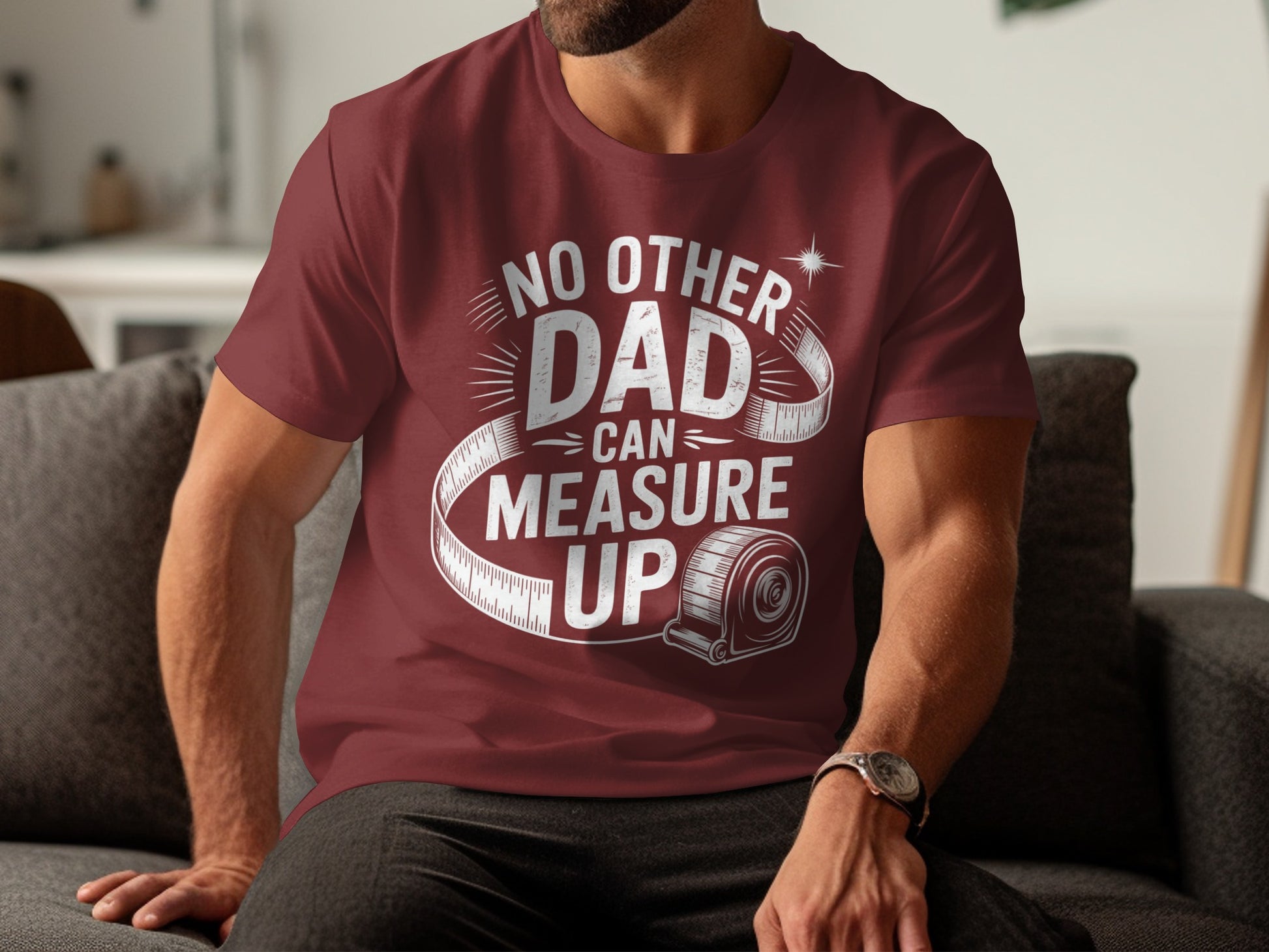 Maroon t-shirt with white text "No other dad can measure up" and a tape measure graphic.