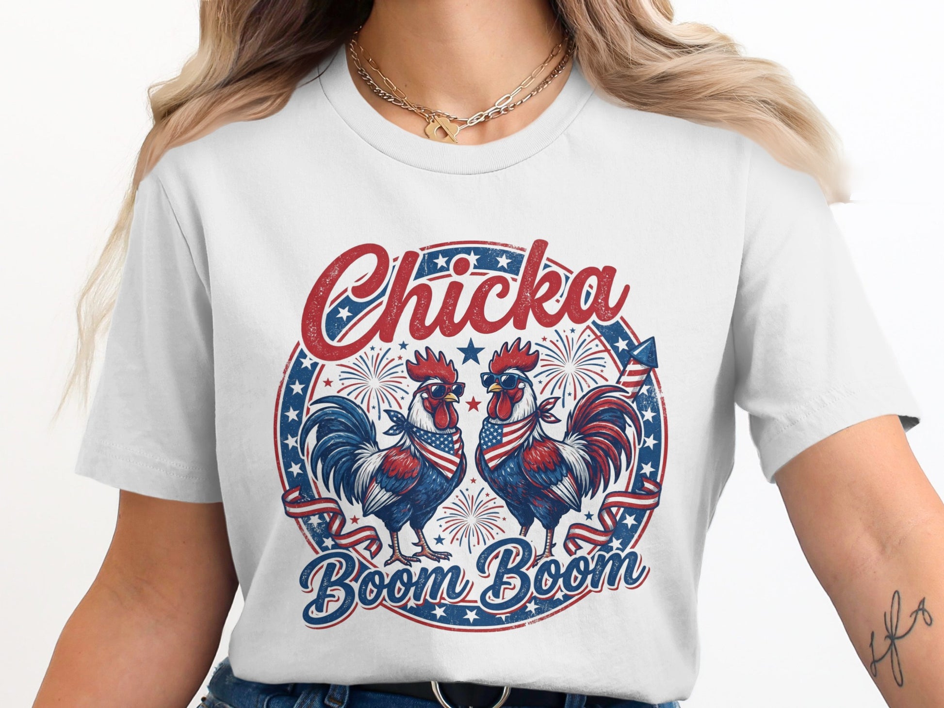 White t-shirt with "Chicka Boom Boom" text and two roosters wearing sunglasses.