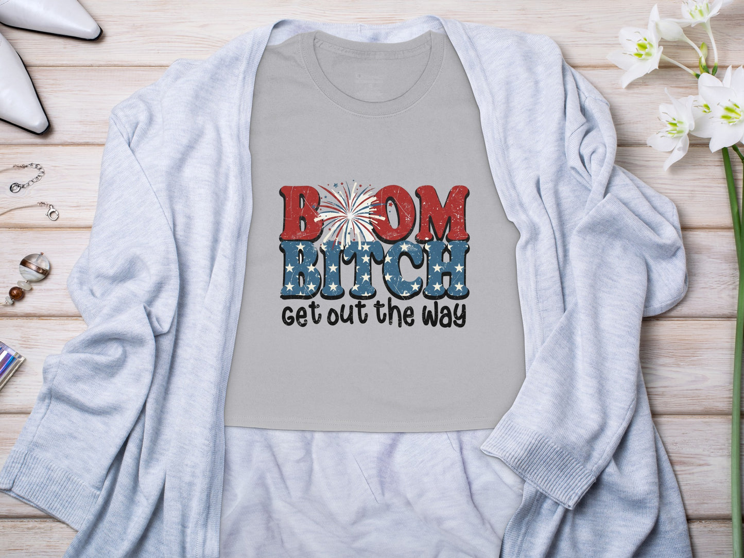 Grey t-shirt with red, white, and blue "BOOM BITCH get out the way" text.
