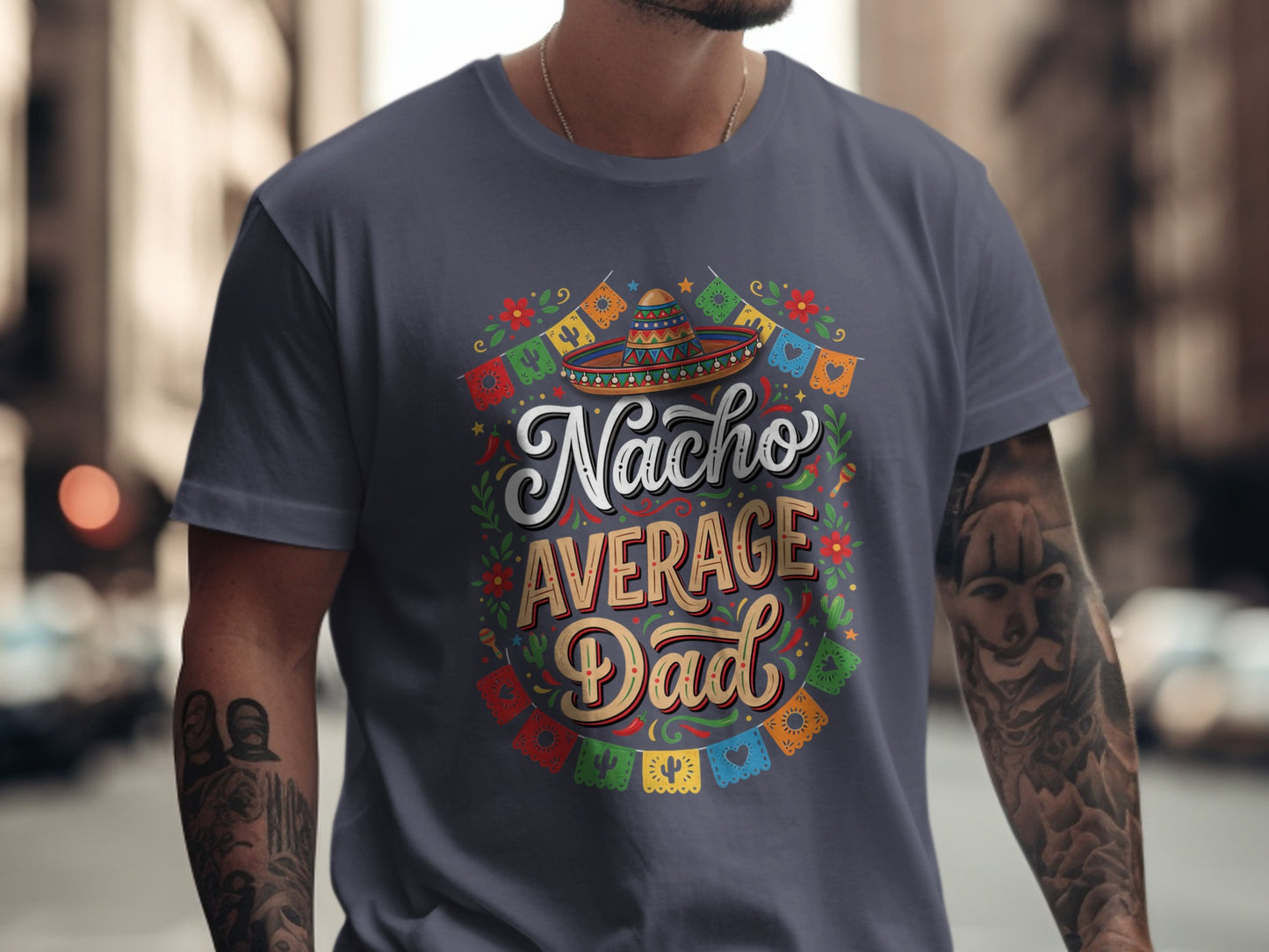 T-shirt with "Nacho Average Dad" text, sombrero, and colorful festive decorations.