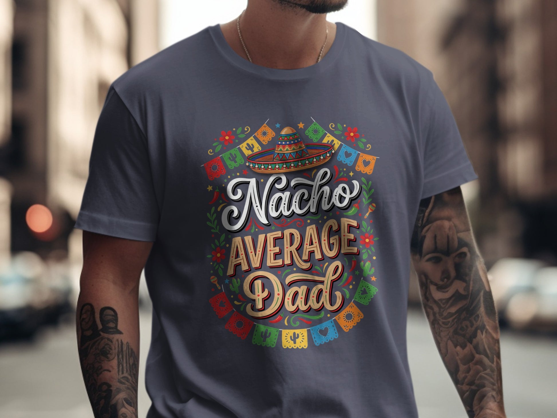 T-shirt with "Nacho Average Dad" text, sombrero, and colorful festive decorations.