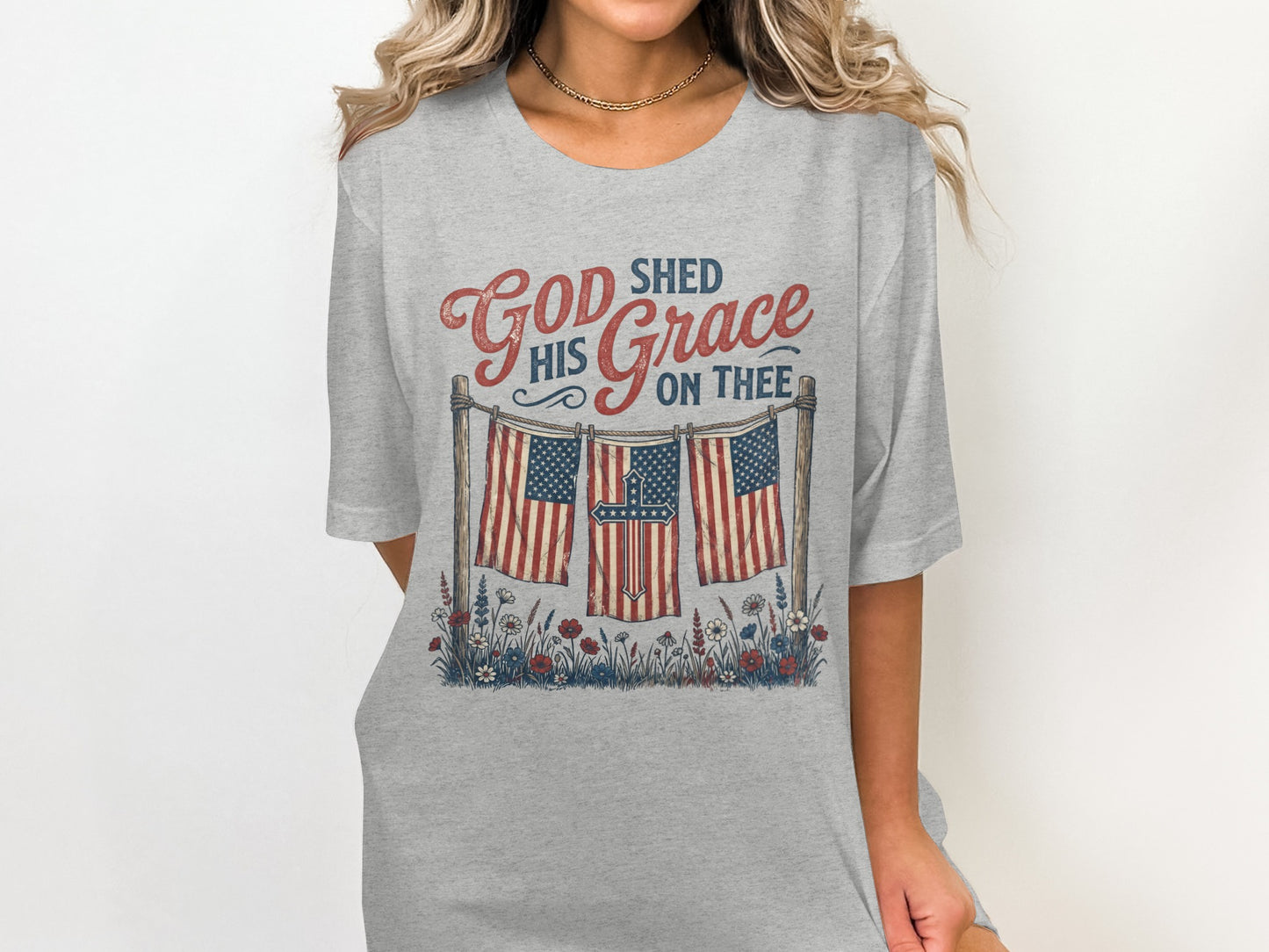 T-shirt with "God Shed His Grace On Thee" and three American flags.