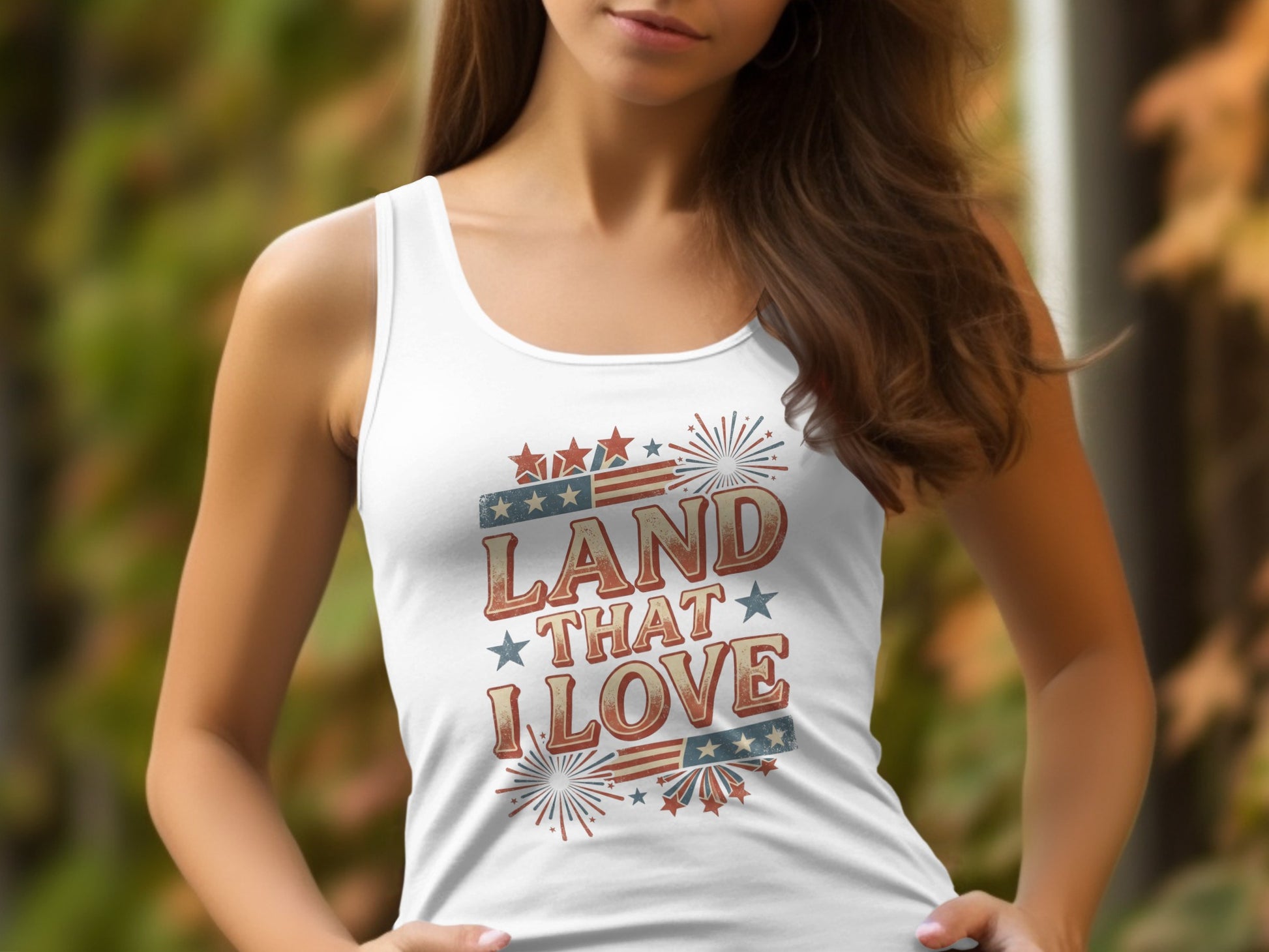 White tank top with distressed "Land That I Love" American flag design.