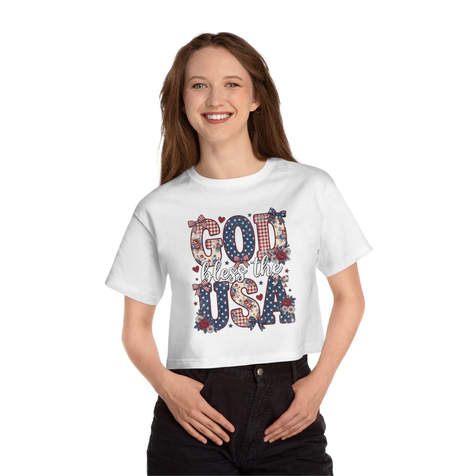 White cropped t-shirt with "God Bless the USA" text in patriotic patterns.