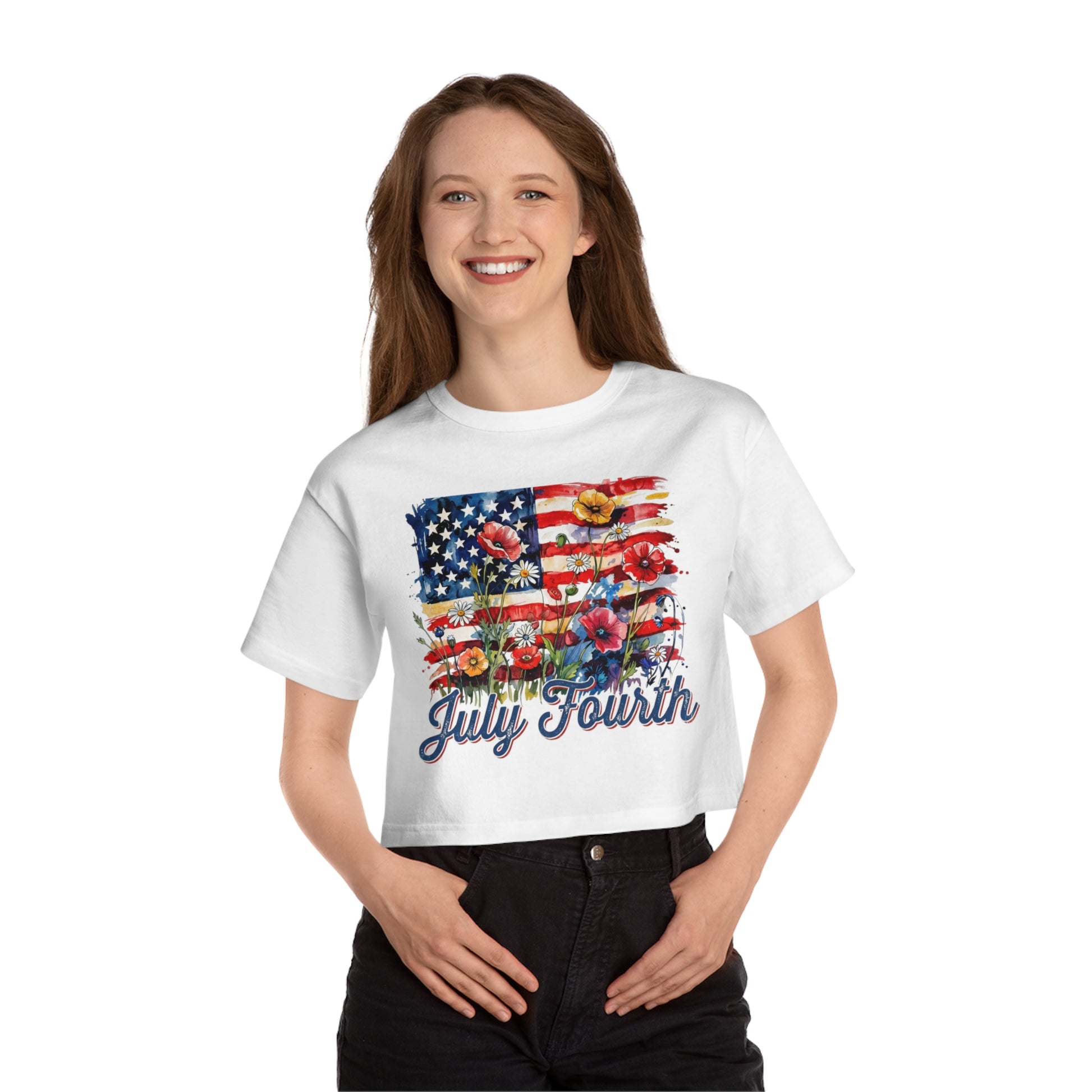 White crop top with watercolor American flag, flowers, and "July Fourth" text graphic.