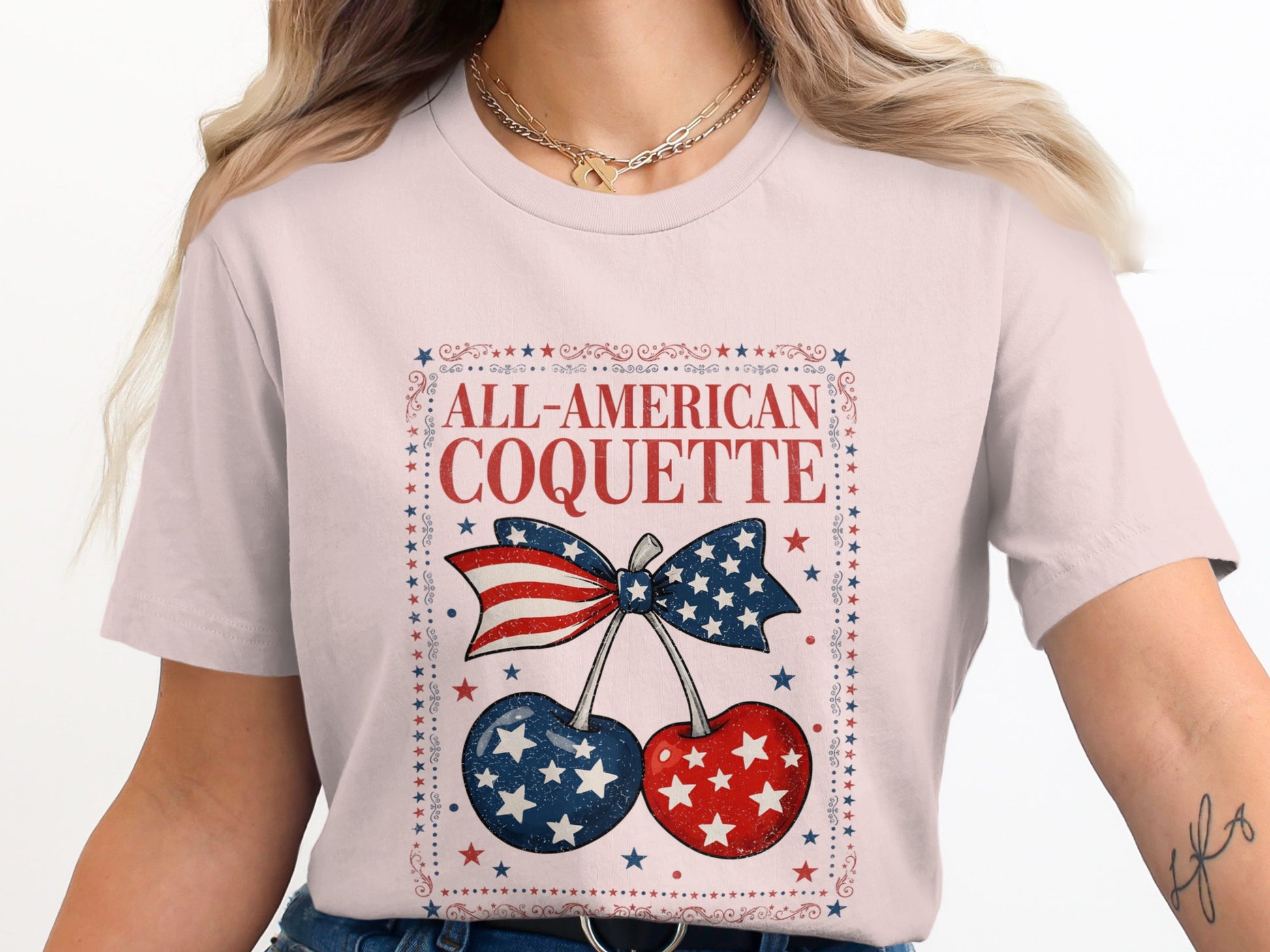 T-shirt with "All-American Coquette" text and cherry graphic.