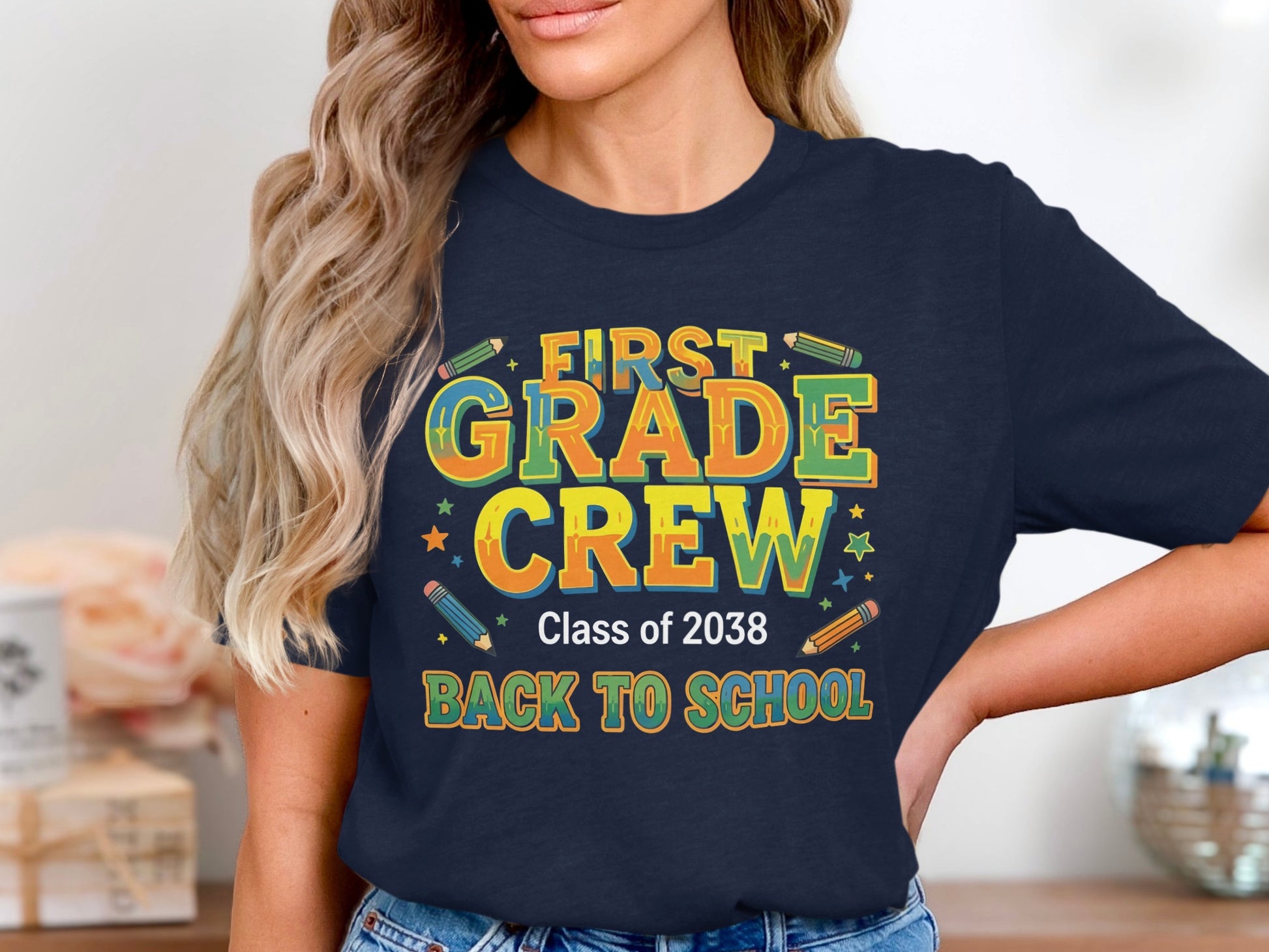 First Grade Crew Class of 2038 Back To School graphic on a navy t-shirt.