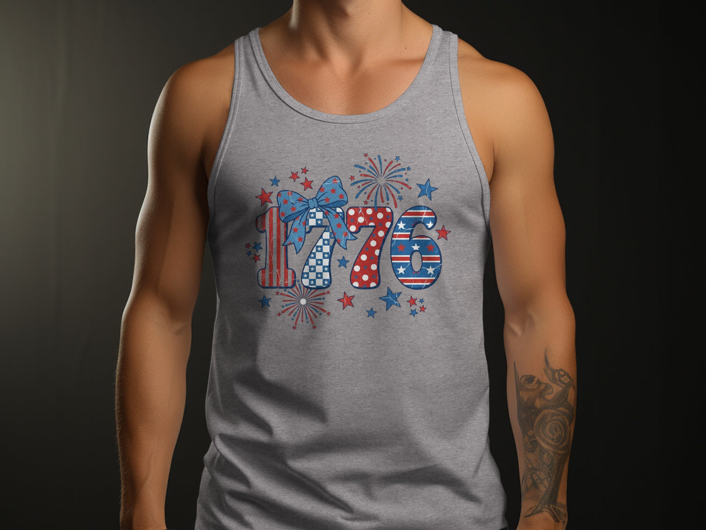 Man wearing gray tank top with "1776" graphic featuring fireworks, stars, and a bow.