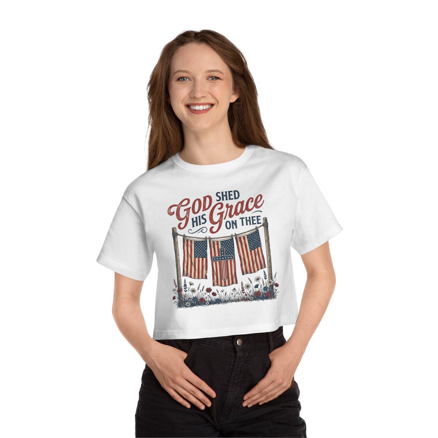 White crop top with "God Shed His Grace On Thee" and American flag graphic.