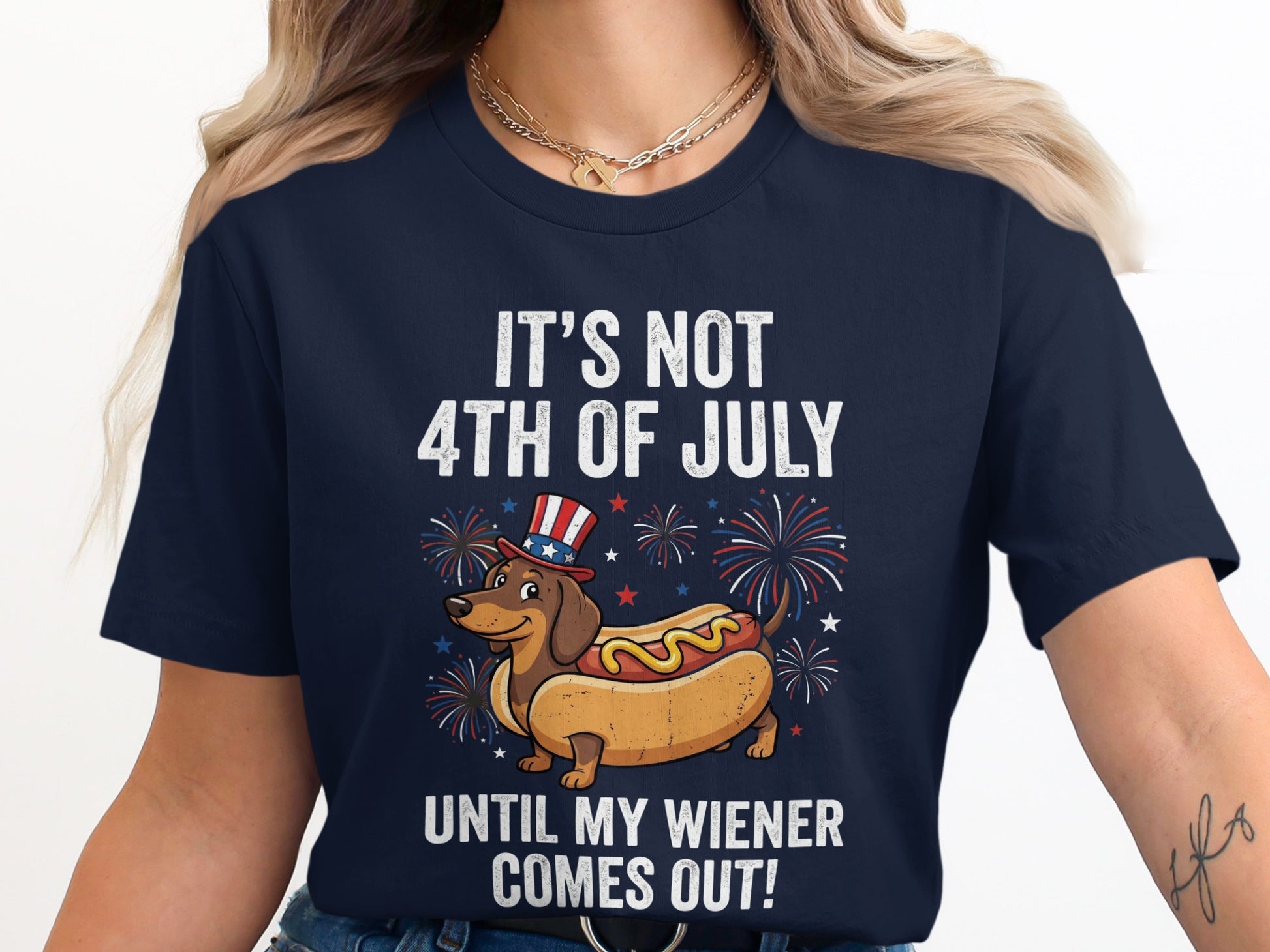 Dark blue t-shirt with a dachshund in a hot dog bun celebrating the Fourth of July.