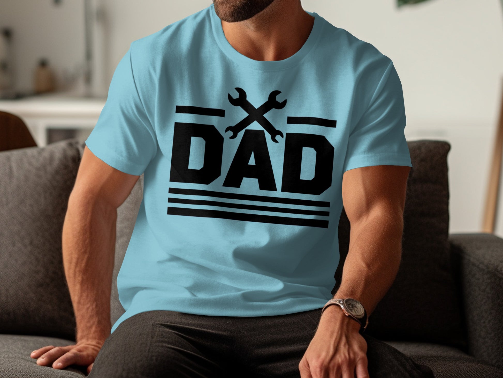 Light blue t-shirt with black "DAD" text and crossed wrenches graphic.
