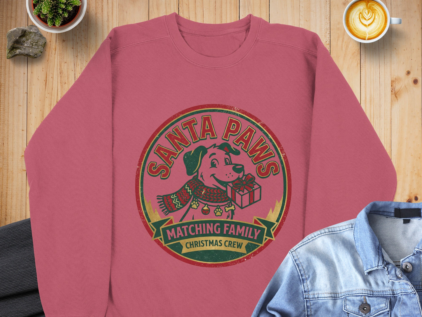 Pink crewneck sweatshirt with "Santa Paws Matching Family Christmas Crew" dog graphic.