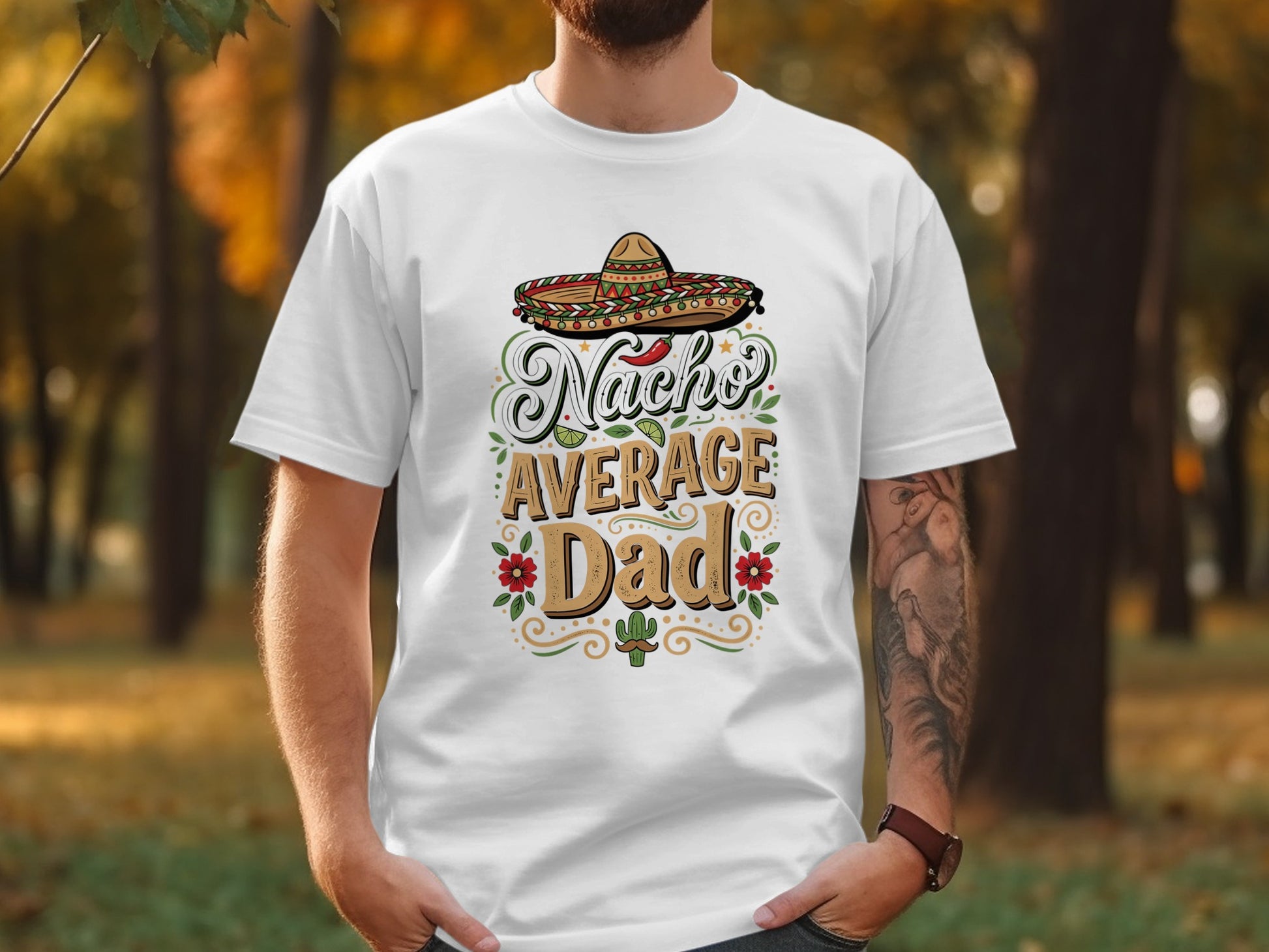 Nacho Average Dad text on a white t-shirt with sombrero and cactus graphics.