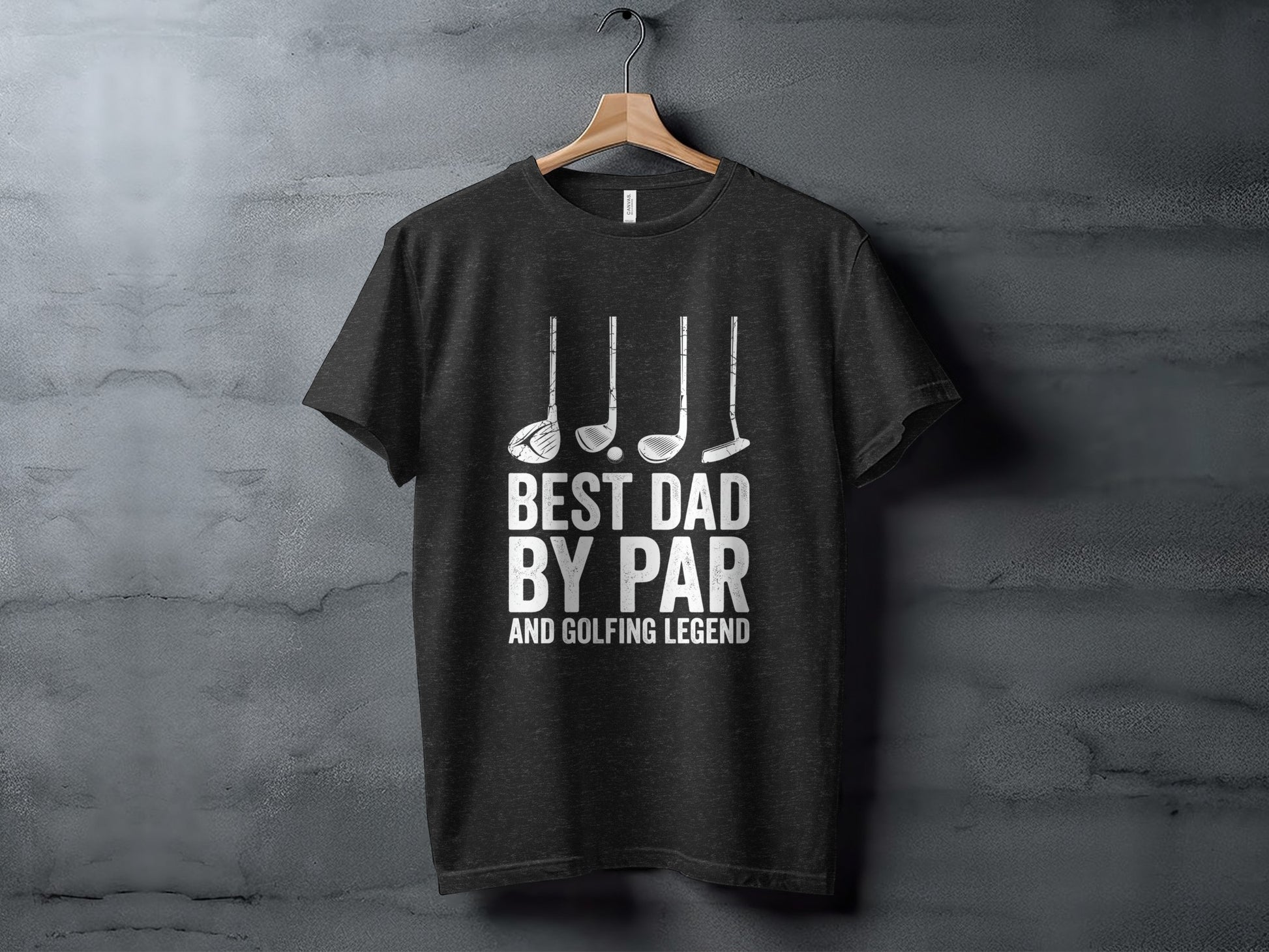 Dark t-shirt with graphic "BEST DAD BY PAR AND GOLFING LEGEND" and golf clubs.
