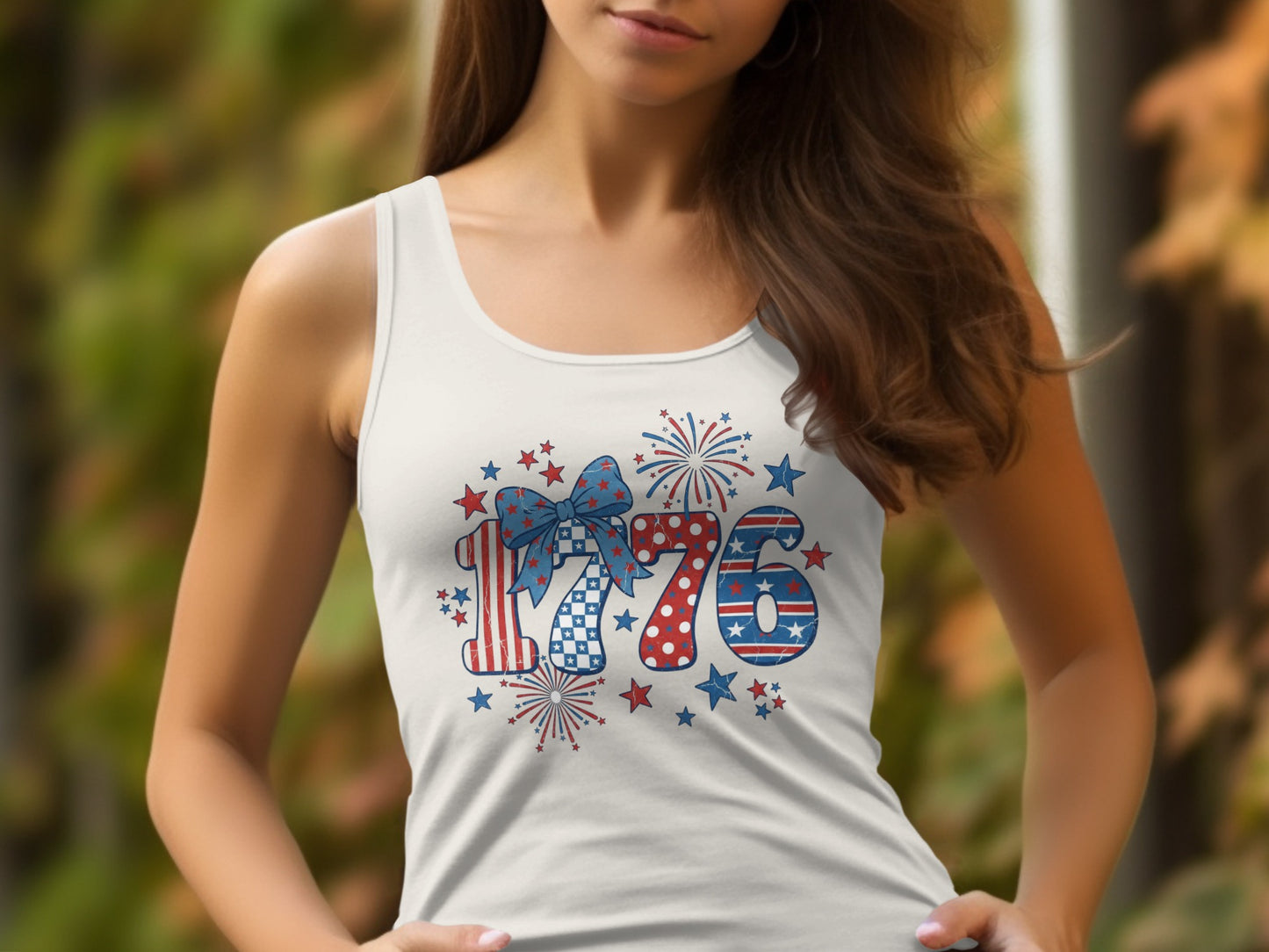 White tank top with distressed "1776" graphic featuring fireworks, stars, and a bow.