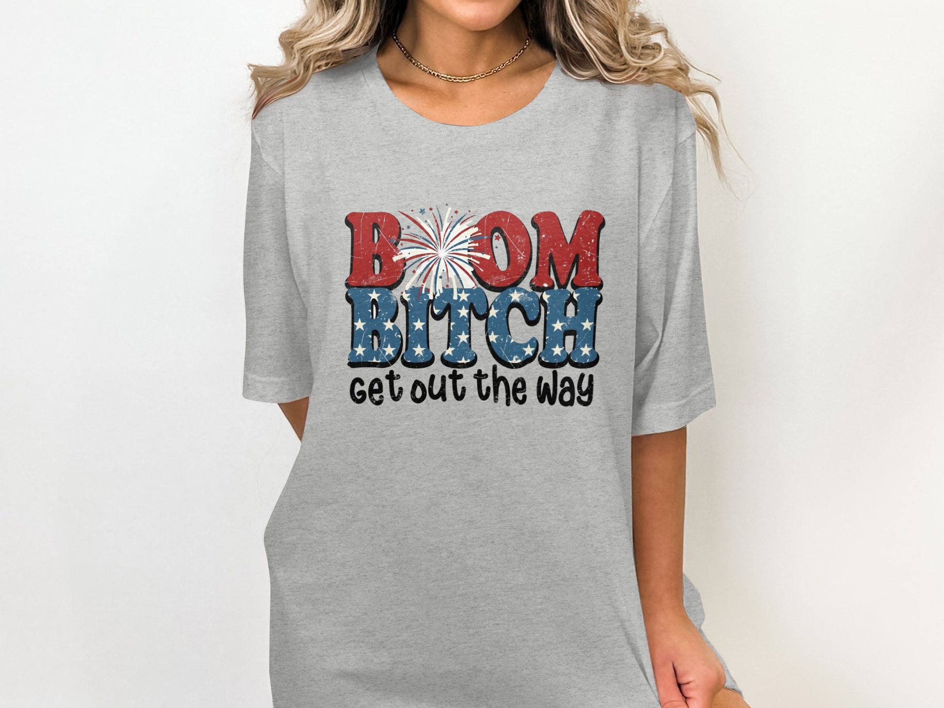 Grey t-shirt with "BOOM BITCH get out the way" text and fireworks.
