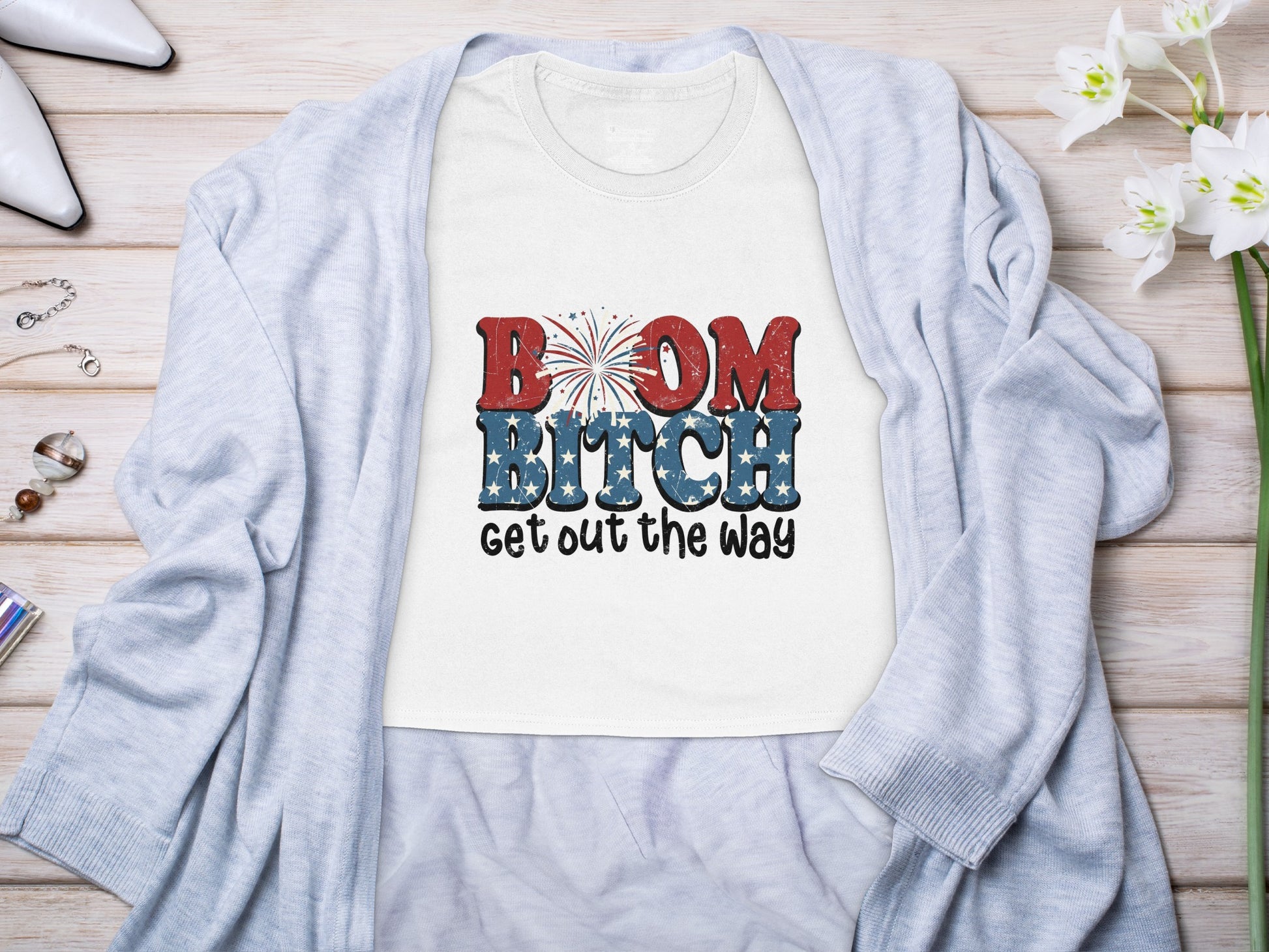 White t-shirt with "BOOM BITCH get out the way" text and patriotic graphic.