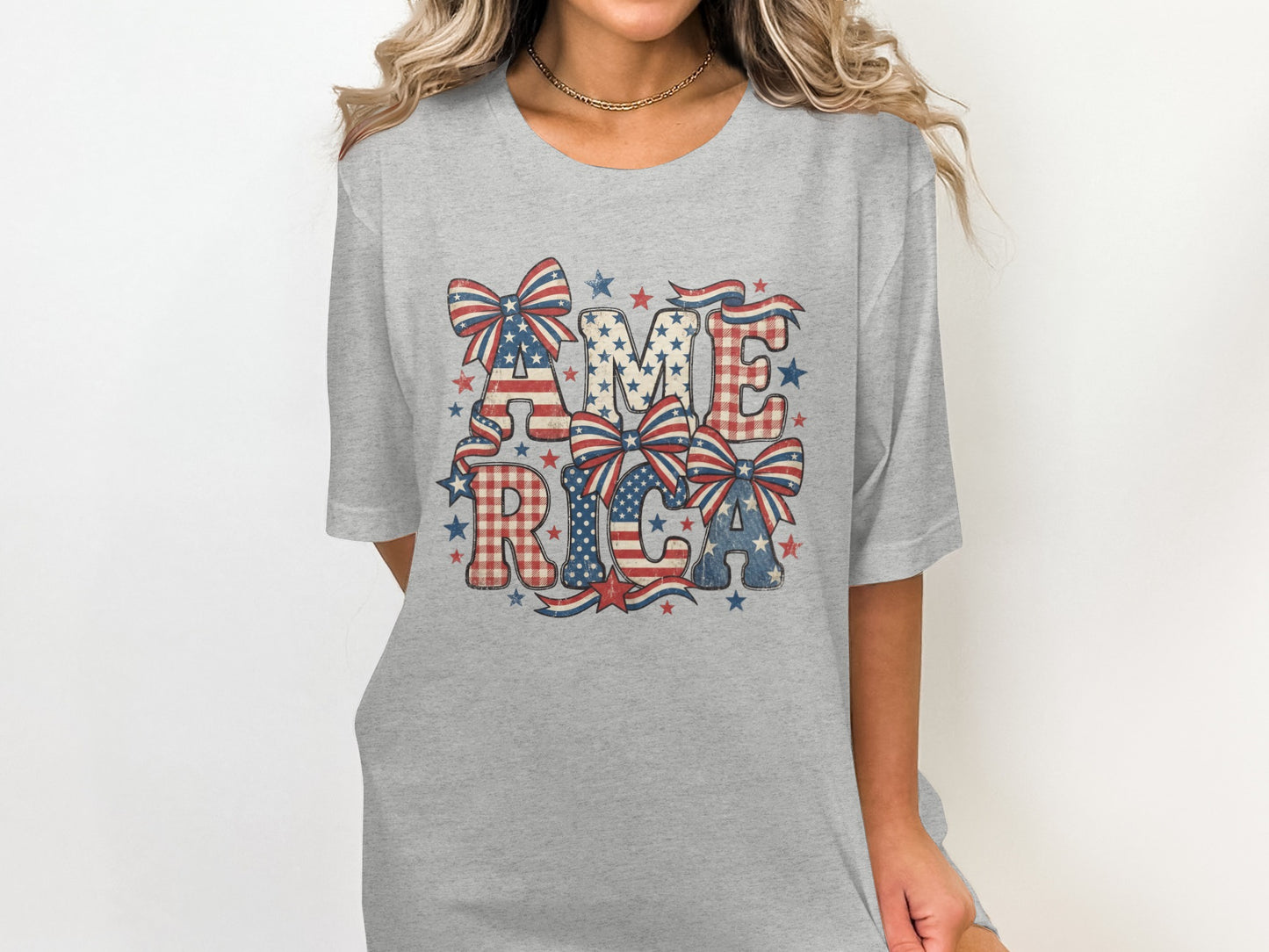 Grey t-shirt with "AMERICA" text in red, white, and blue patriotic designs.
