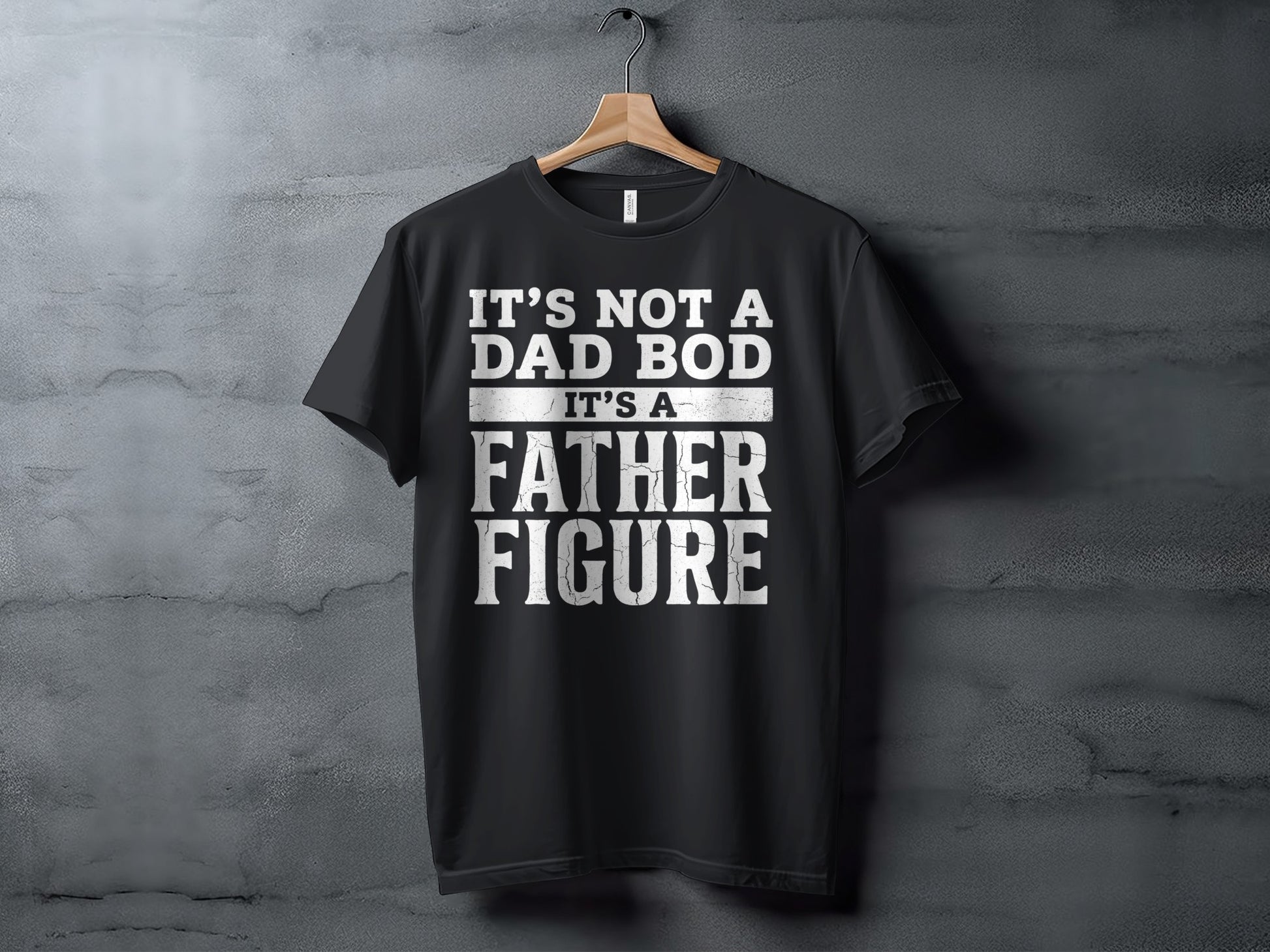 Black t-shirt with white text "IT'S NOT A DAD BOD IT'S A FATHER FIGURE".