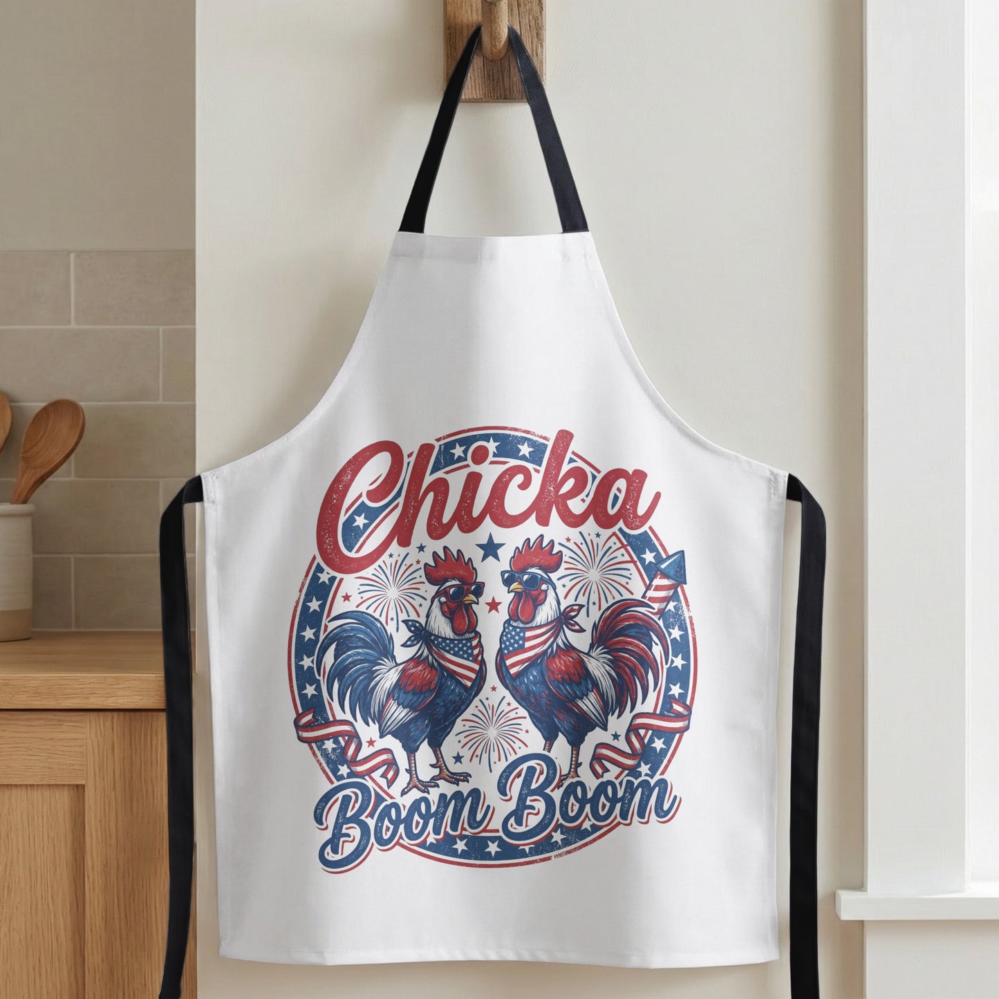 White apron with two roosters wearing sunglasses and American flag bandanas.