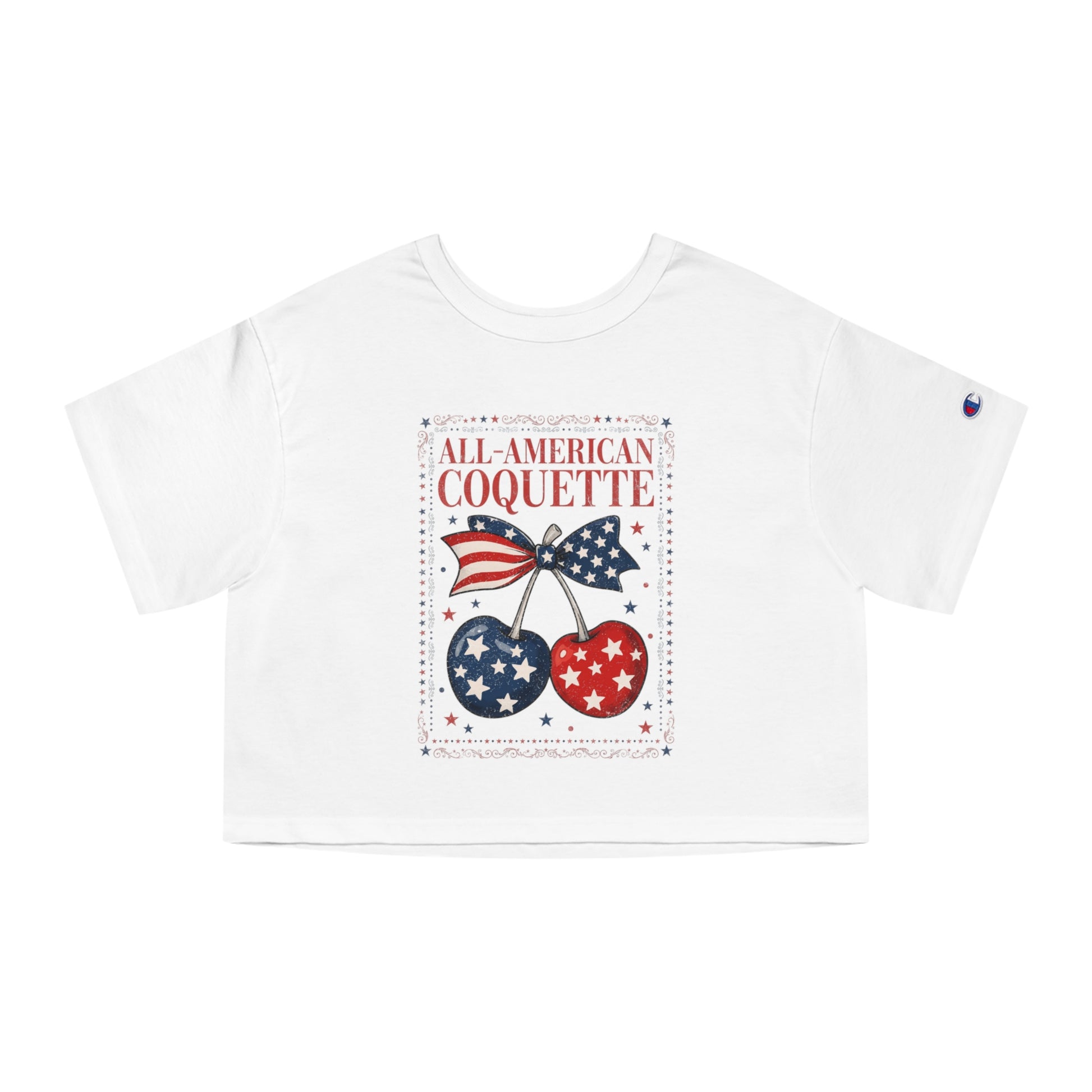 White t-shirt with red and blue patriotic cherries and text "ALL-AMERICAN COQUETTE".