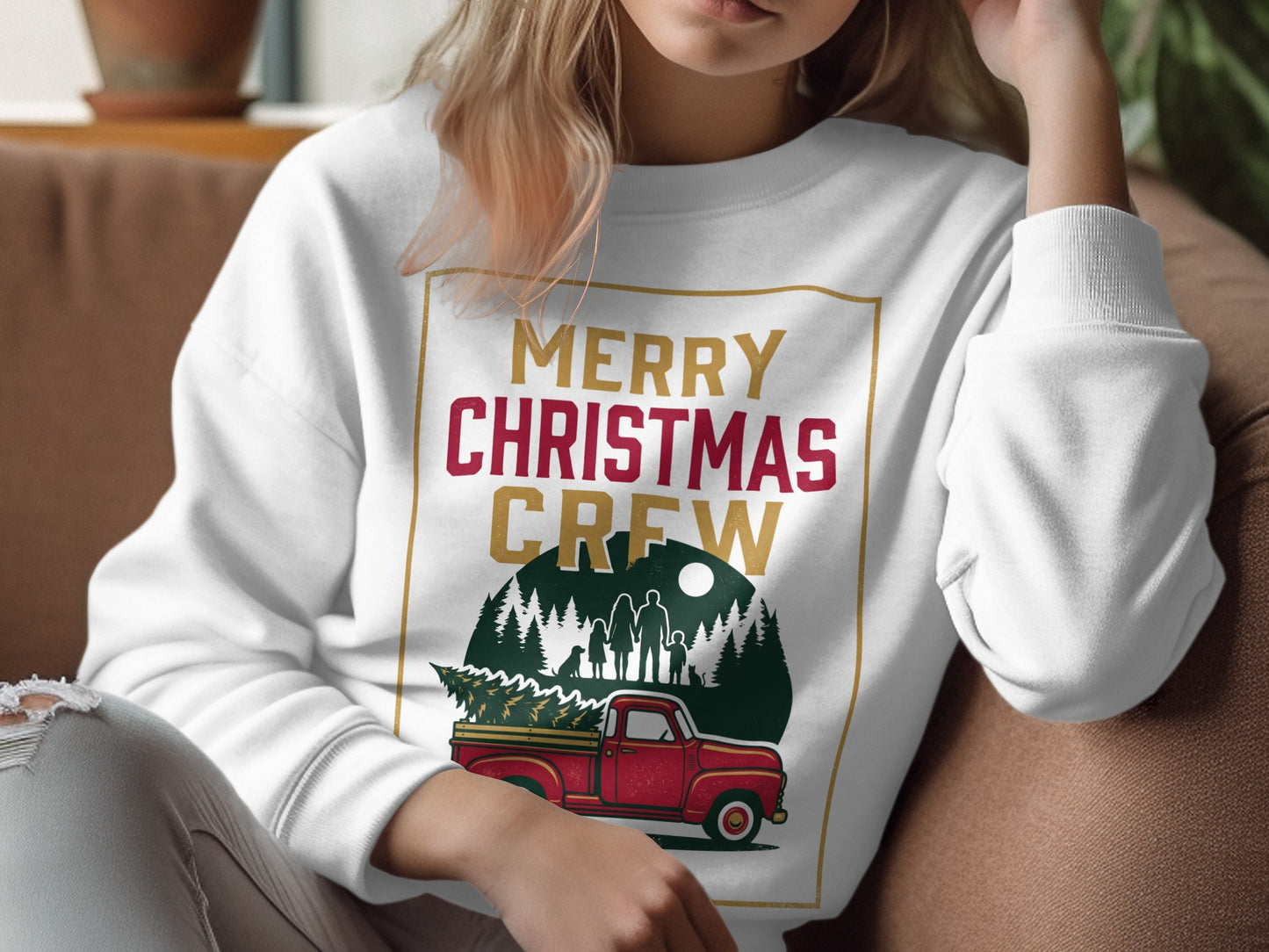 White sweatshirt with "Merry Christmas Crew" text and a scene of a family and dog with a Christmas tree.