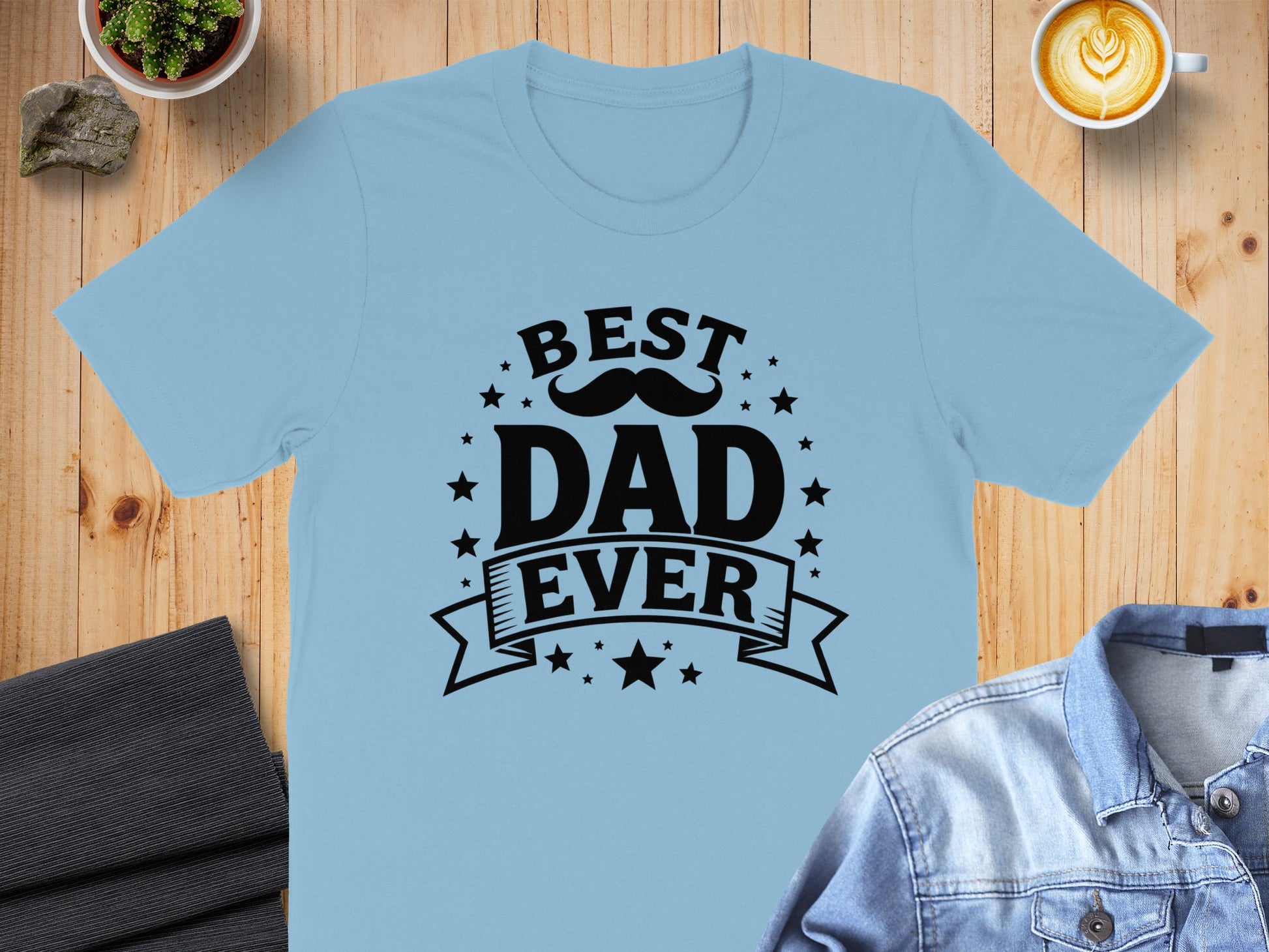 Light blue t-shirt with "BEST DAD EVER" text and a mustache design.