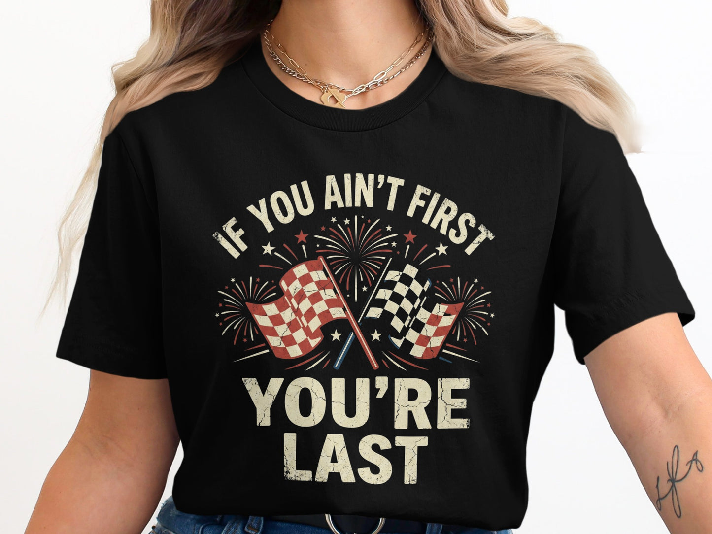 Black t-shirt with checkered flags, fireworks, and text "IF YOU AIN'T FIRST YOU'RE LAST".