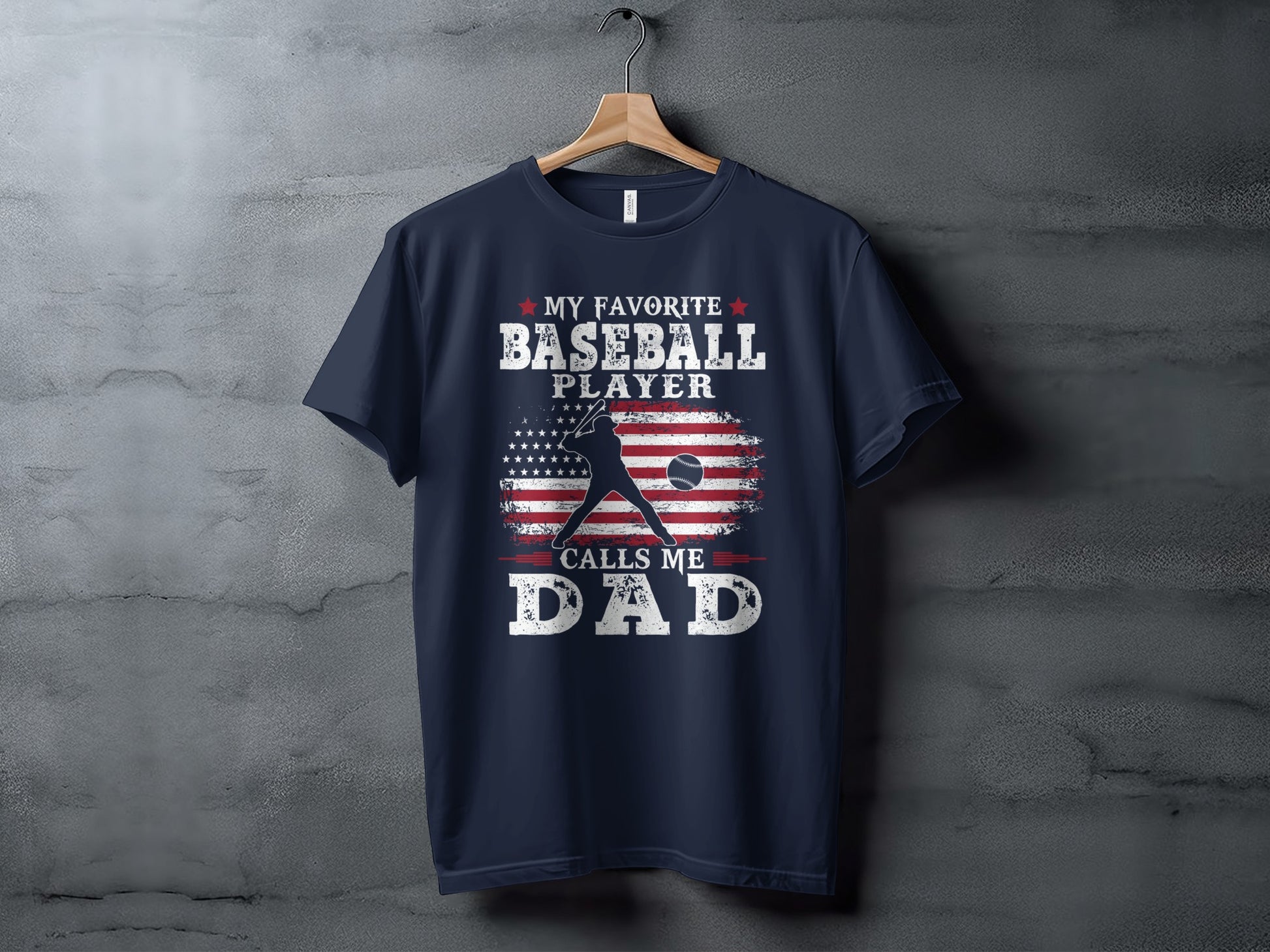 Navy t-shirt with American flag and text "My Favorite Baseball Player Calls Me Dad".