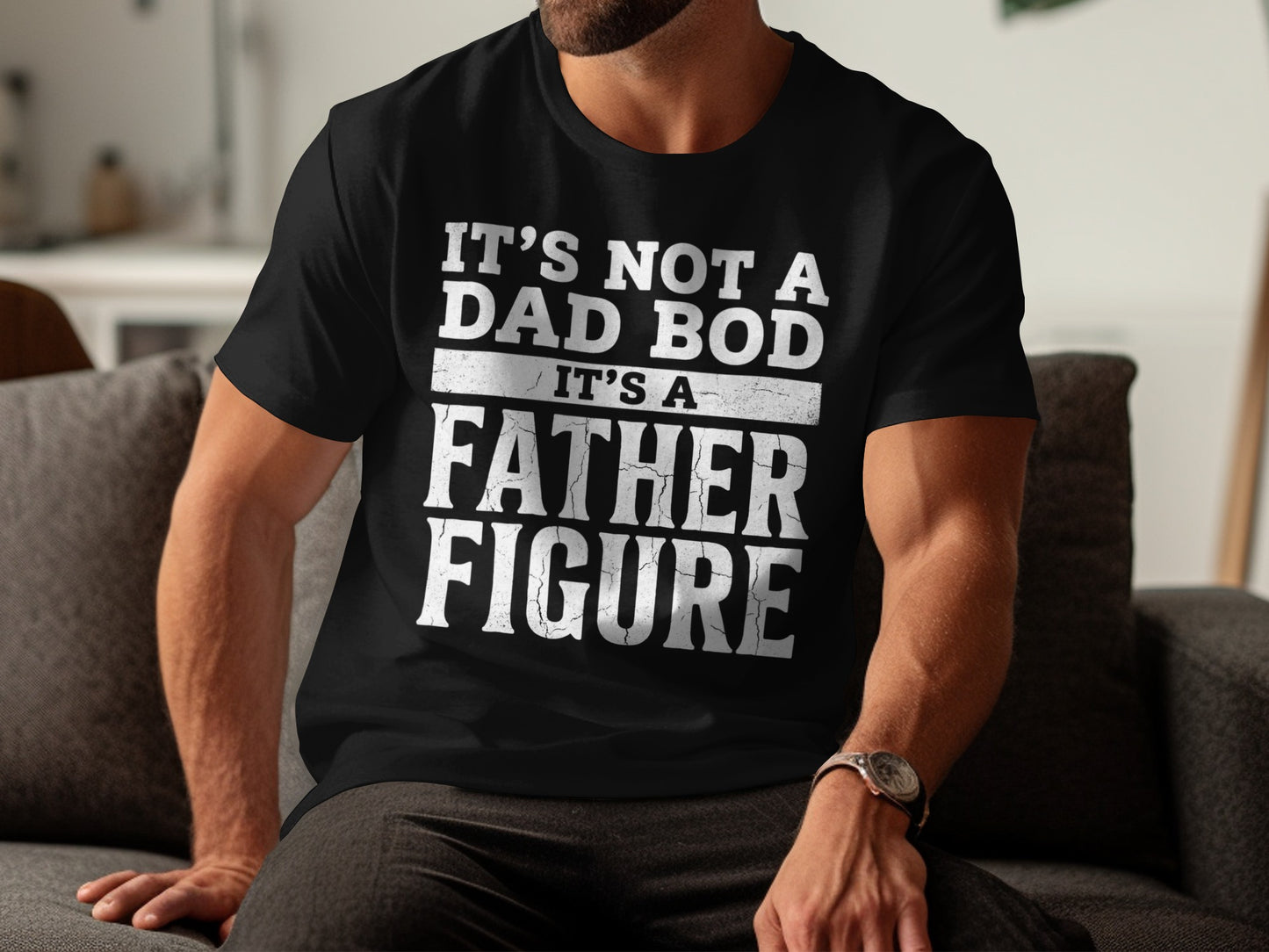 Black t-shirt with white text: "IT'S NOT A DAD BOD IT'S A FATHER FIGURE".