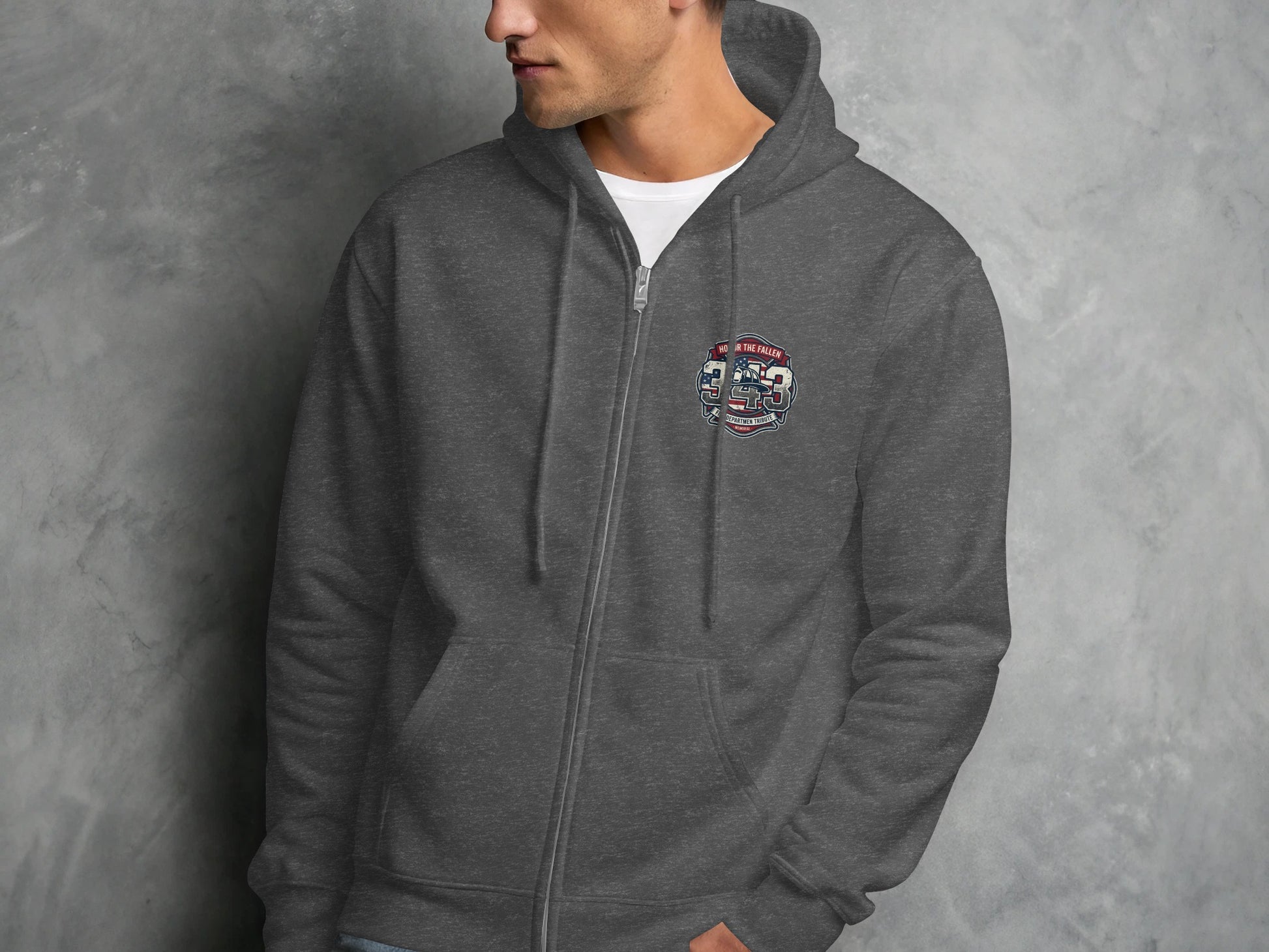 Dark grey zip-up hoodie on a man with a "343" badge.