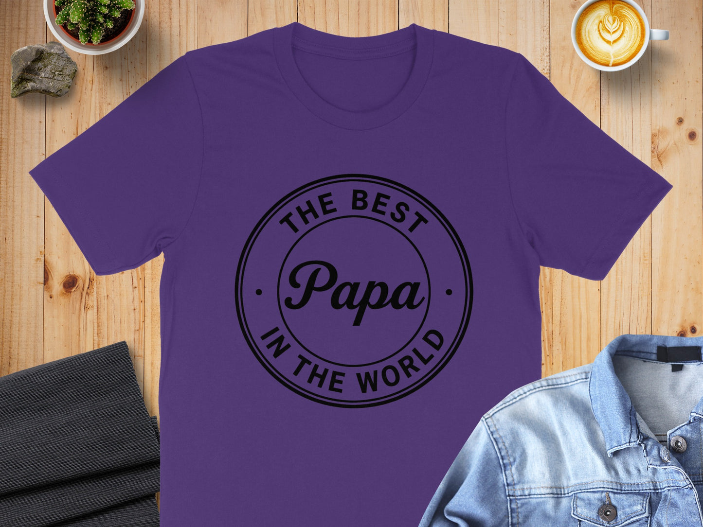 Purple t-shirt with "The Best Papa in the World" text in a circle.
