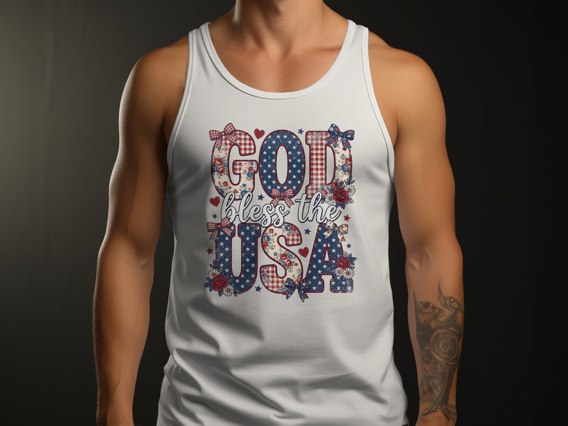 White tank top with "God bless the USA" text in patriotic floral and gingham patterns.