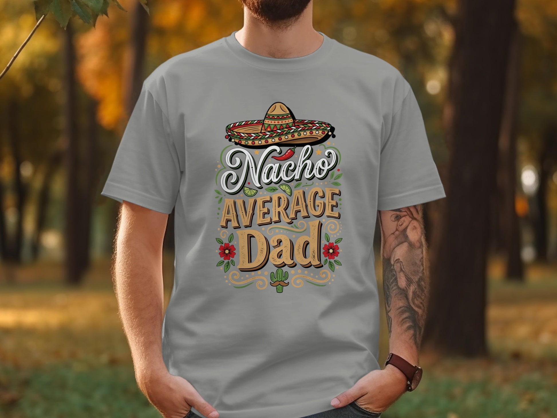 Gray t-shirt with "Nacho Average Dad" text and sombrero design.