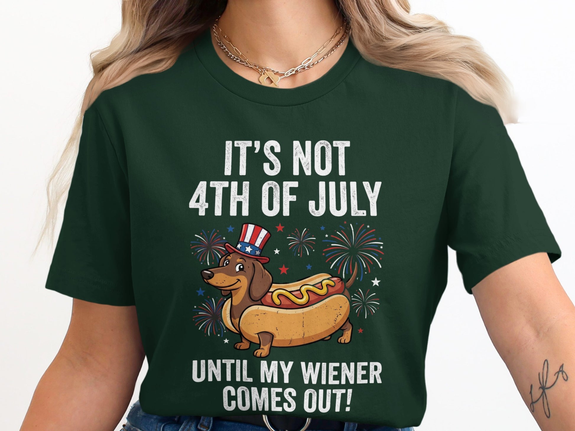 Green t-shirt with dachshund in hot dog bun, celebrating 4th of July.