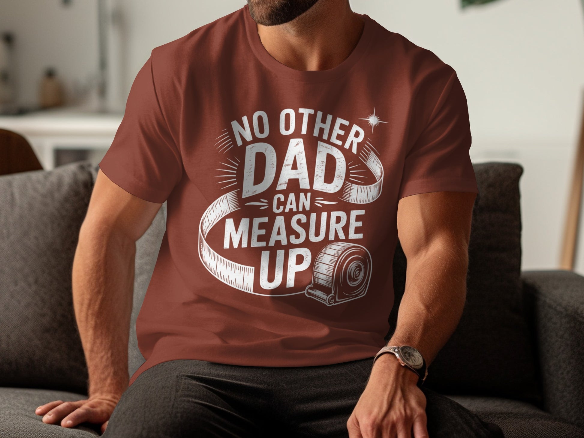 Man wearing a maroon t-shirt with "NO OTHER DAD CAN MEASURE UP" text.