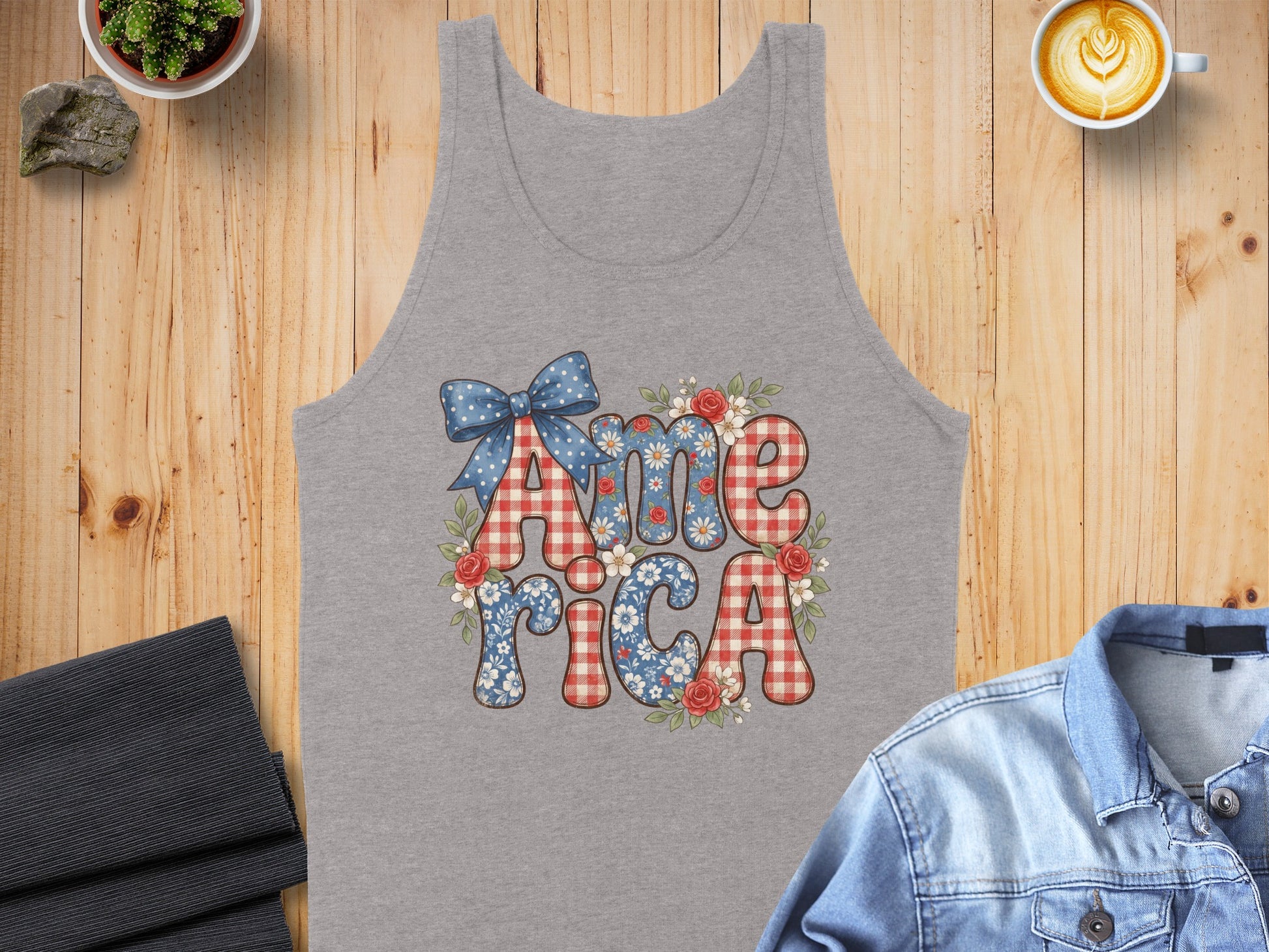Gray tank top with "America" graphic featuring blue and red plaid and floral patterns.