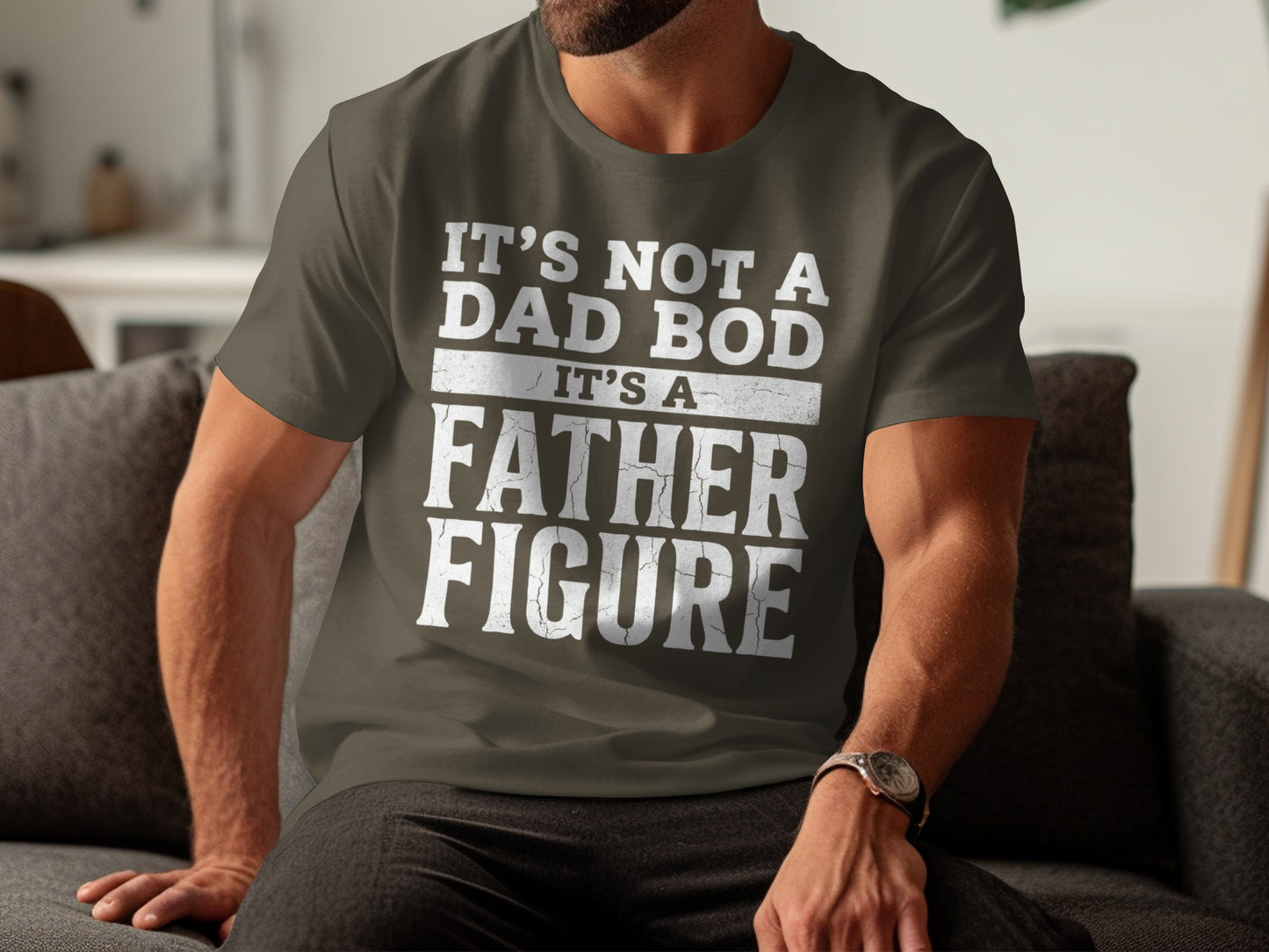 Dark grey t-shirt with white text "IT'S NOT A DAD BOD IT'S A FATHER FIGURE".