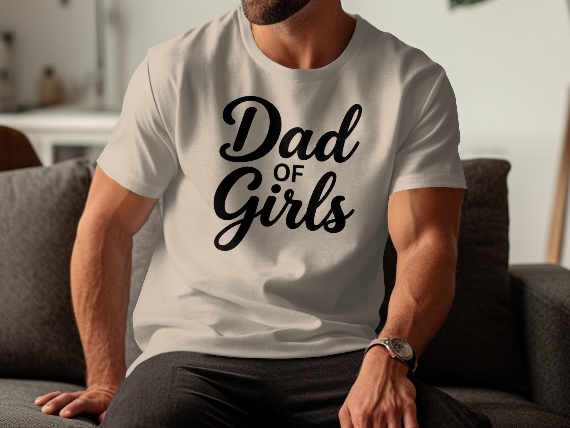 White t-shirt with "Dad of Girls" text on a seated man.