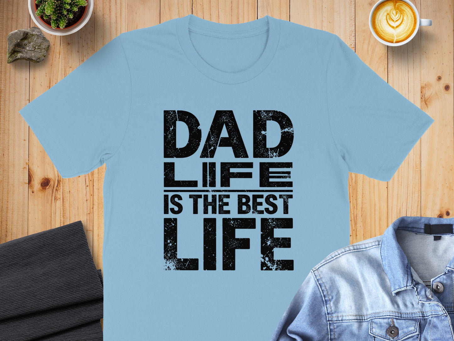 Light blue t-shirt with black text "DAD LIFE IS THE BEST LIFE".