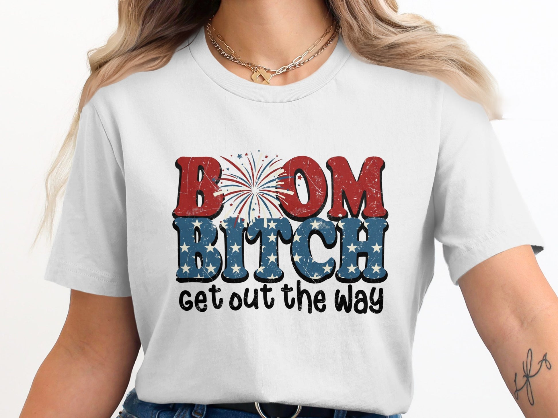 White t-shirt with "BOOM BITCH GET OUT THE WAY" in patriotic lettering and fireworks.