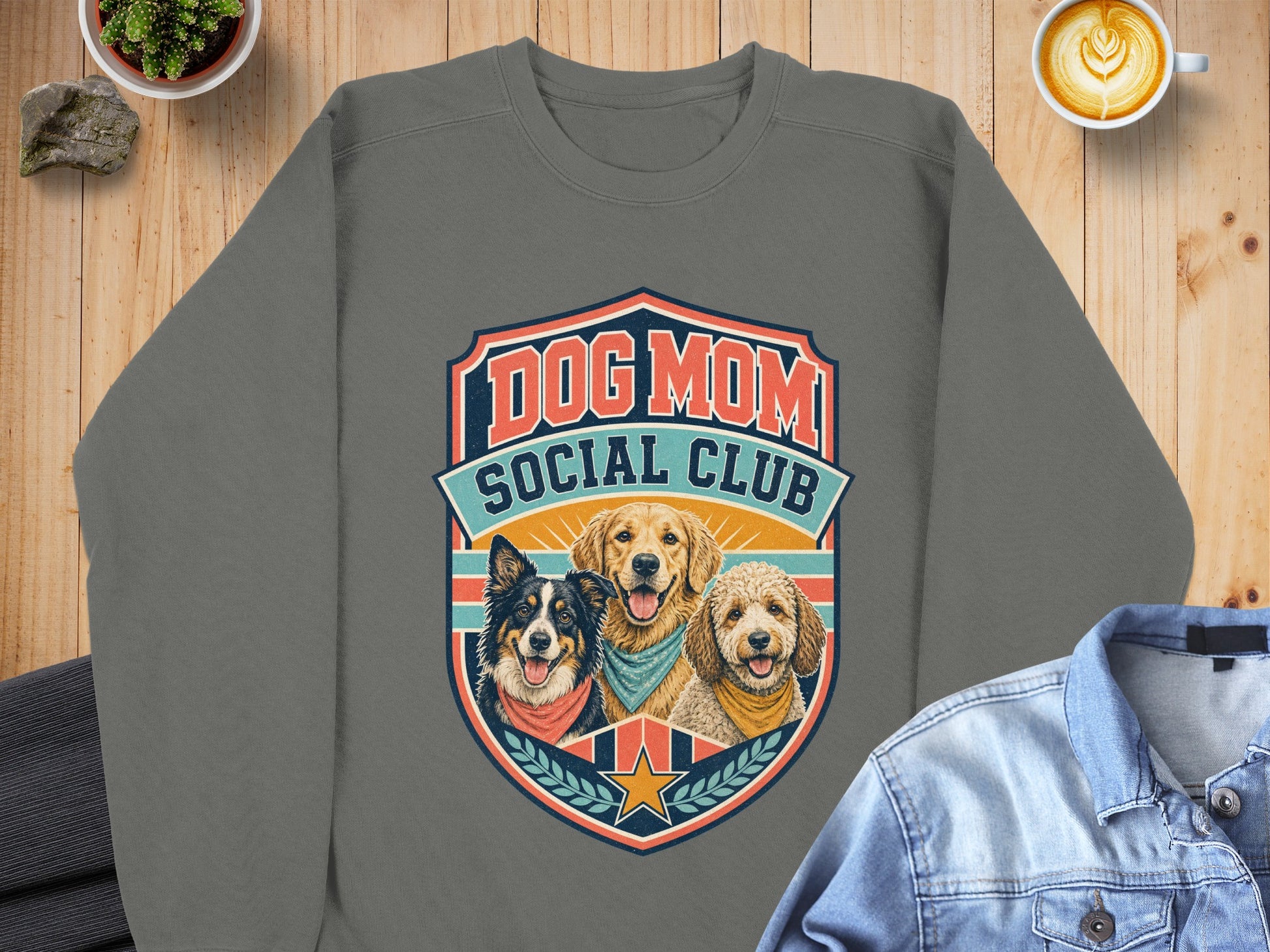 Crewneck sweatshirt with "Dog Mom Social Club" text and three dogs wearing bandanas.