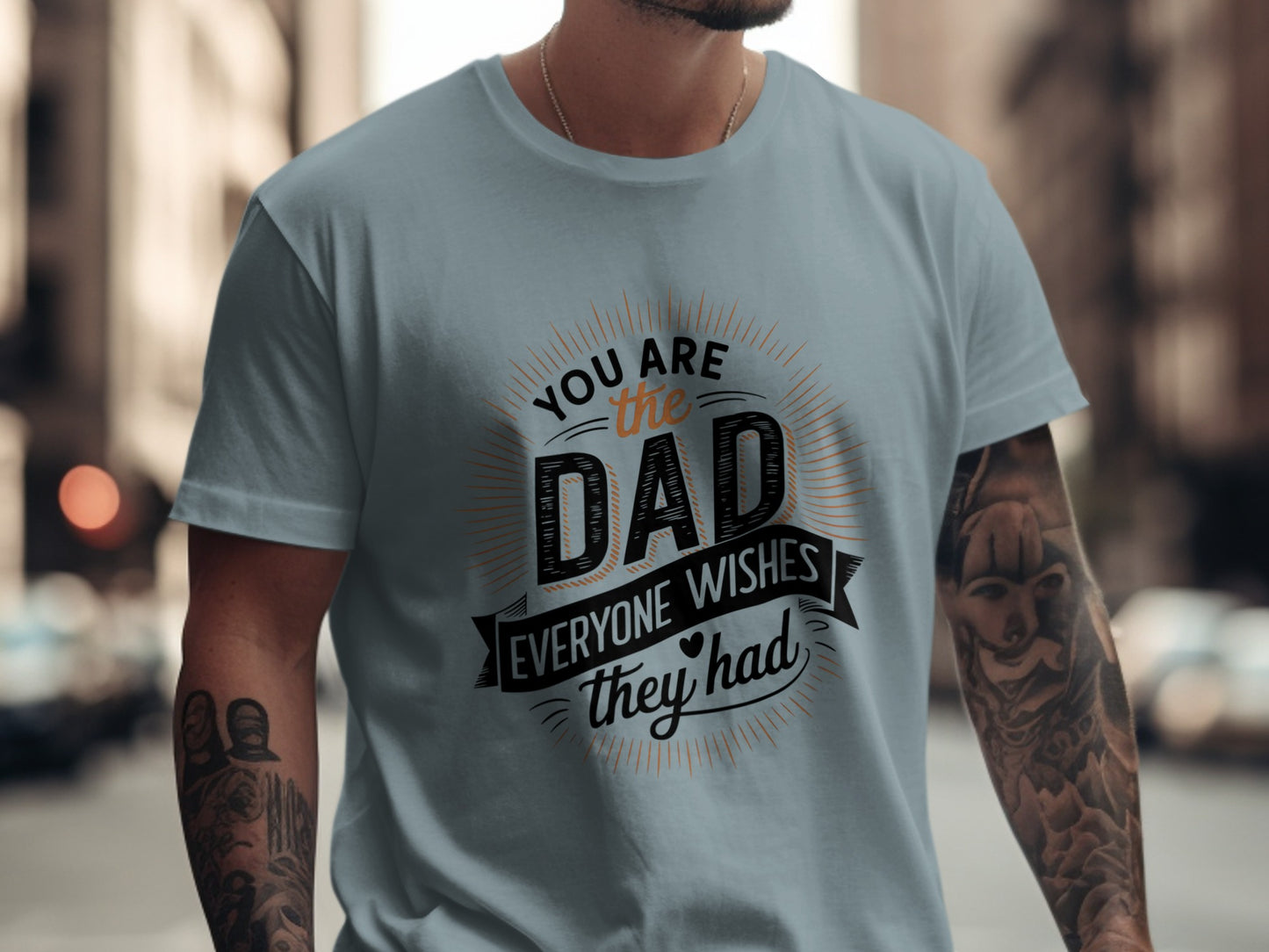 Light blue t-shirt with "You are the dad everyone wishes they had" text design.