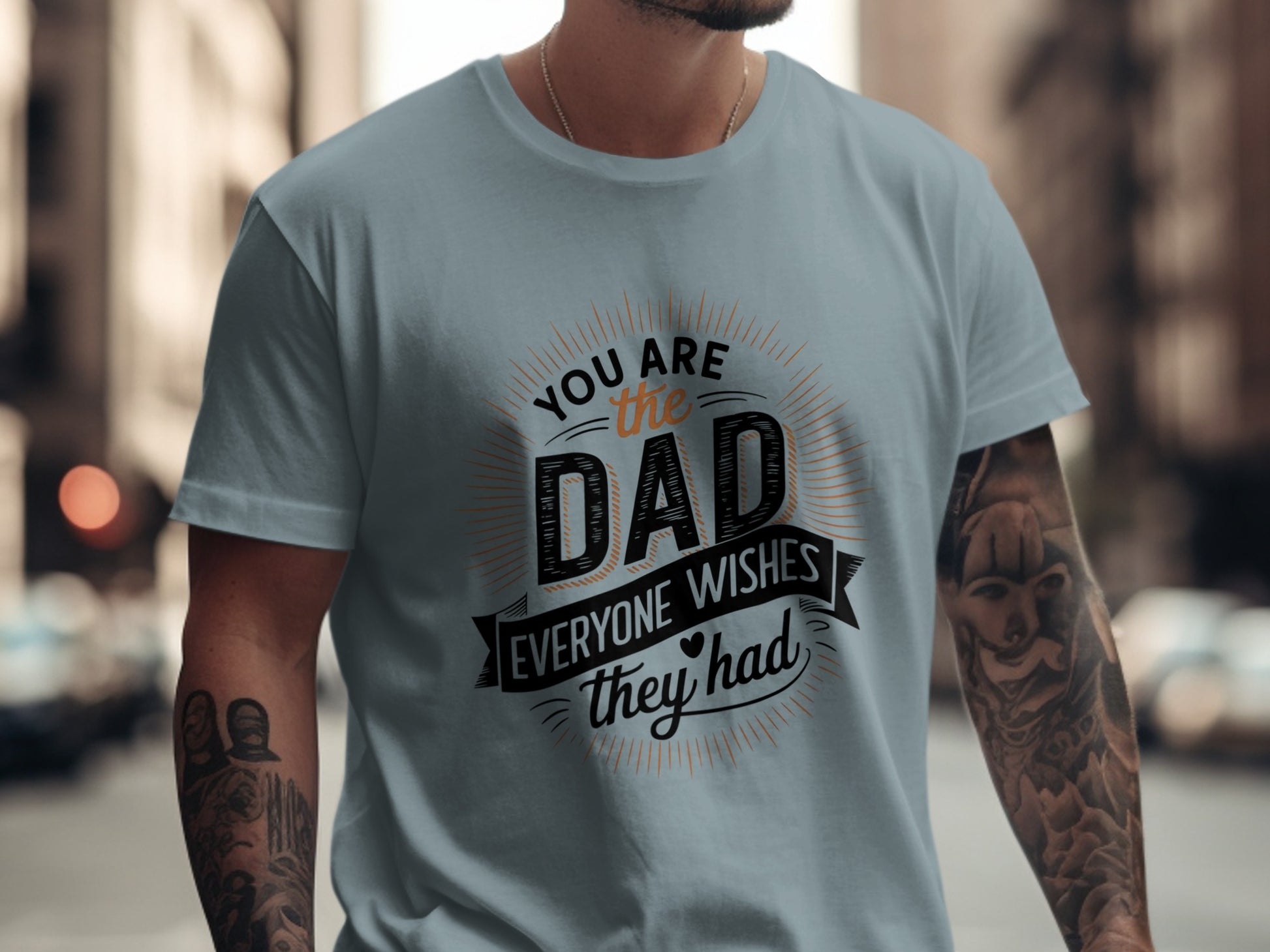 Light blue t-shirt with "You are the dad everyone wishes they had" text design.