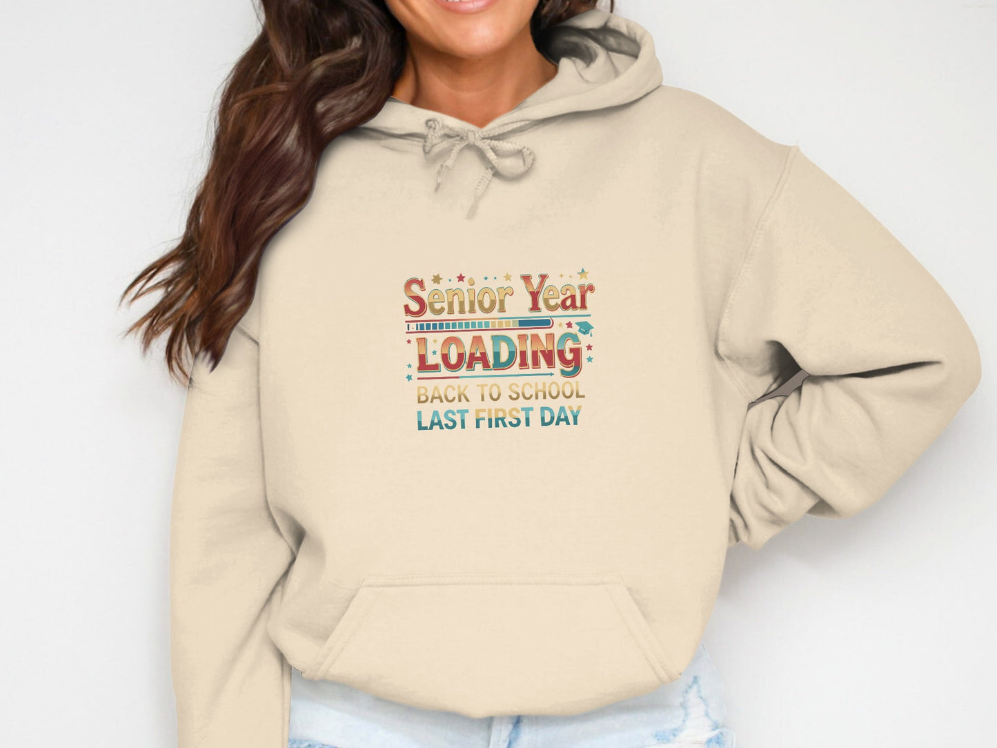 Beige hoodie with "Senior Year LOADING" text and graduation cap graphic.