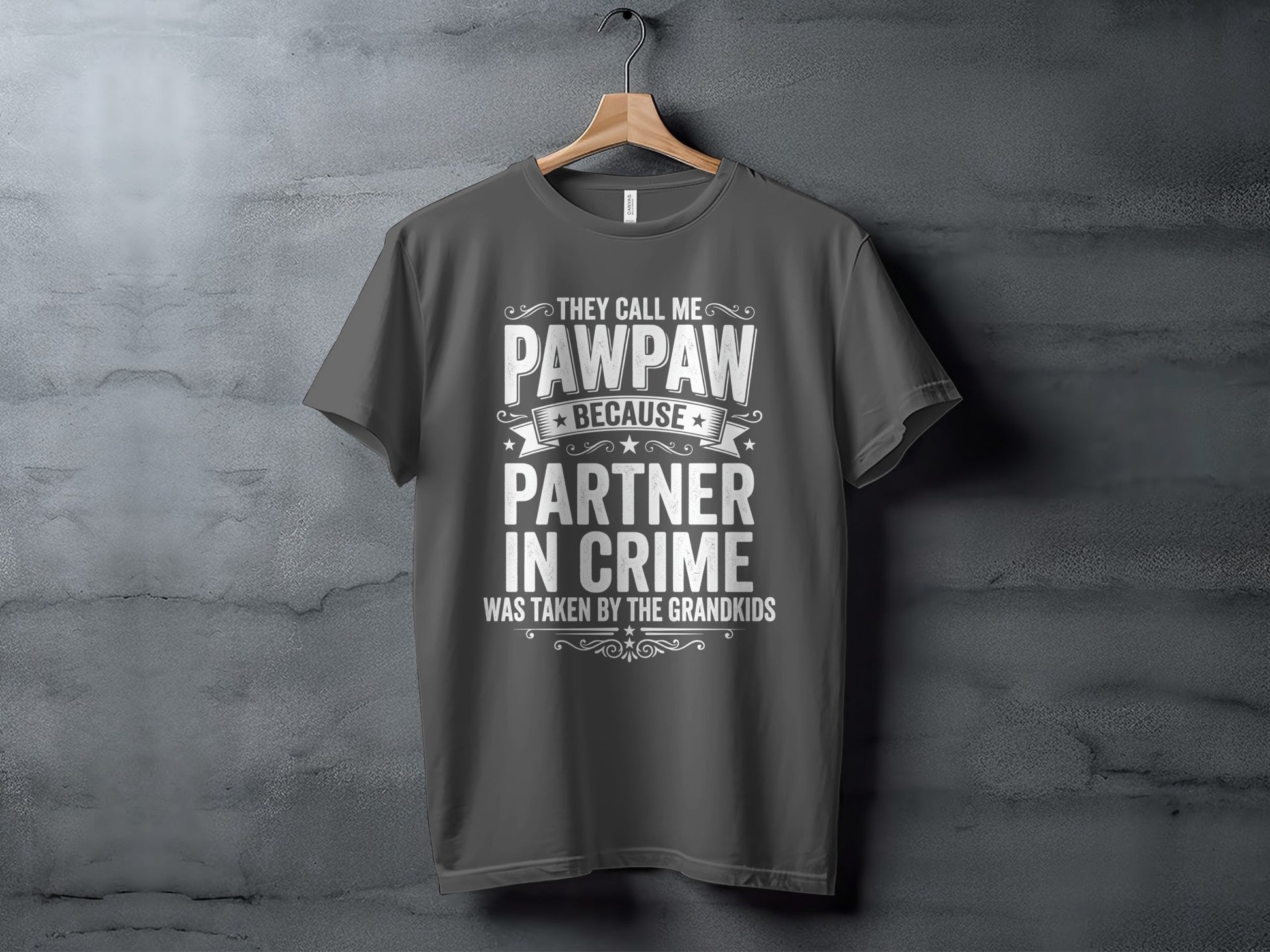 Dark gray t-shirt with "They call me Pawpaw because partner in crime was taken by the grandkids" text.